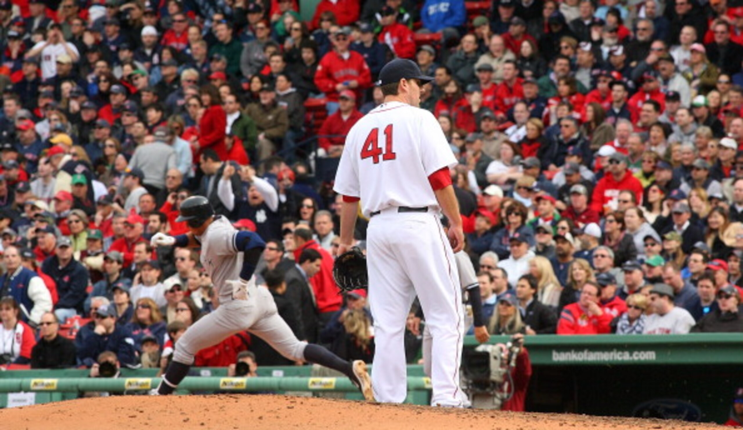 BOSTON, MA - APRIL 8:  John Lackey #41 of the Boston Red Sox reacts as Alex Rodriguez #13 of the New York Yankees rounds the bases after hitting a home run in the fifth inning against the Boston Red Sox during opening game at Fenway Park, April 8, 2011 in