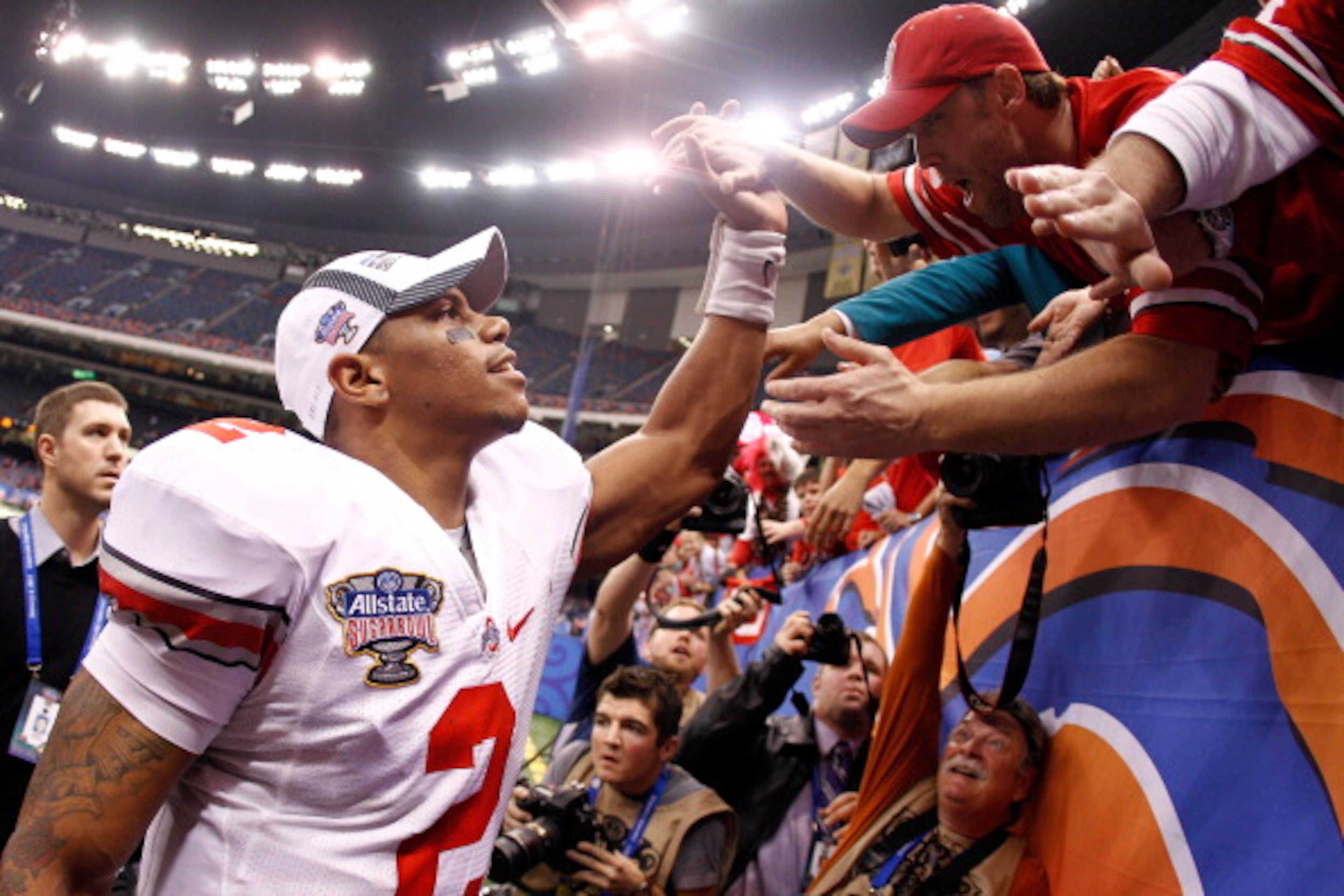 NEW ORLEANS, LA - JANUARY 04: Quarterback Terrelle Pryor #2 of the Ohio State Buckeyes celebrates the Buckeyes 31-26 victory against the Arkansas Razorbacks during the Allstate Sugar Bowl at the Louisiana Superdome on January 4, 2011 in New Orleans, Loui NEW ORLEANS, LA - JANUARY 04: Quarterback Terrelle Pryor #2 of the Ohio State Buckeyes celebrates the Buckeyes 31-26 victory against the Arkansas Razorbacks during the Allstate Sugar Bowl at the Louisiana Superdome on January 4, 2011 in New Orleans, Loui