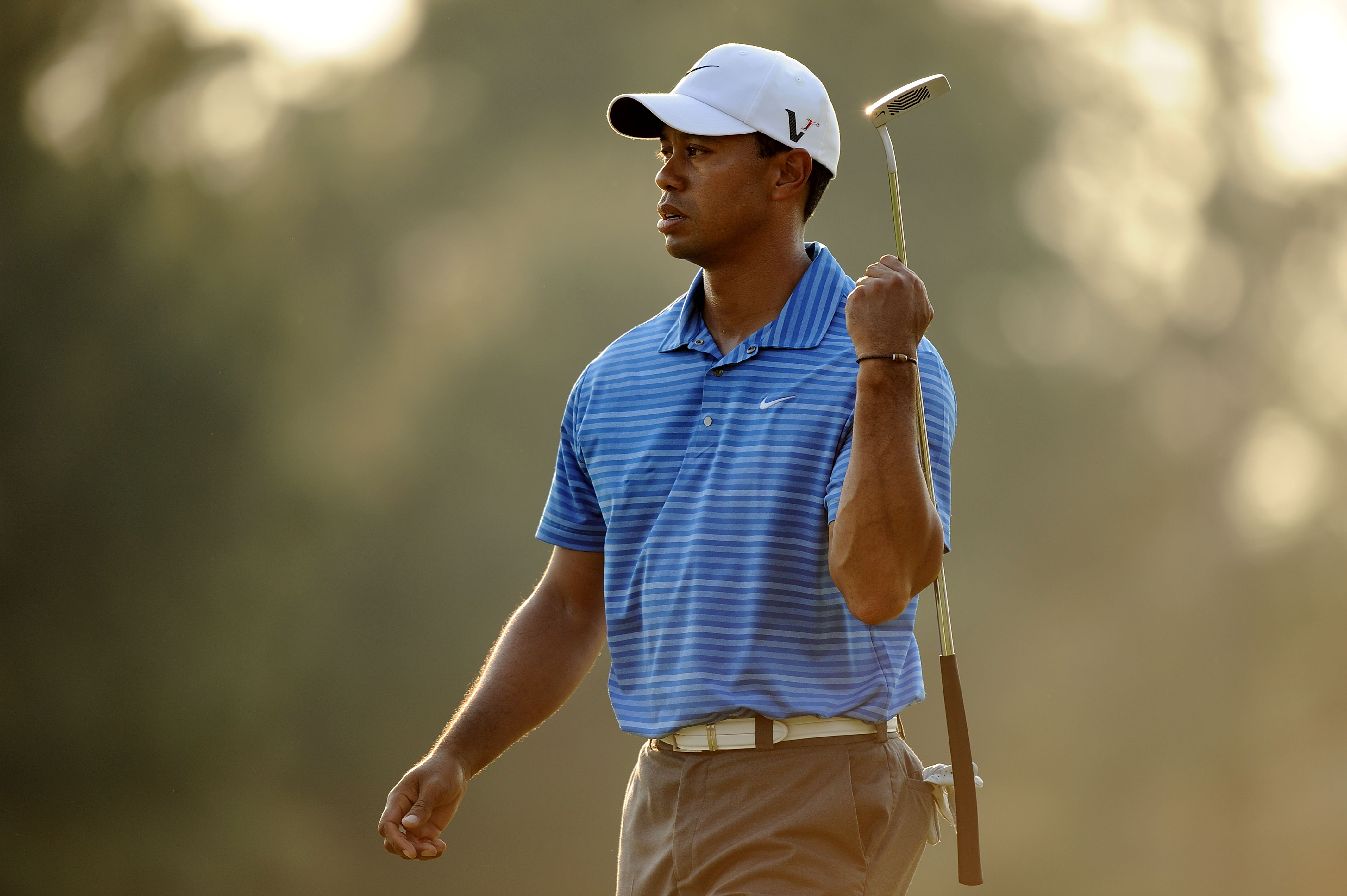 AUGUSTA, GA - APRIL 09:  Tiger Woods walks across the 17th green during the third round of the 2011 Masters Tournament at Augusta National Golf Club on April 9, 2011 in Augusta, Georgia.  (Photo by Harry How/Getty Images)