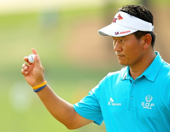 AUGUSTA, GA - APRIL 09:  K.J. Choi of South Korea celebrates a birdie putt on the ninth green during the third round of the 2011 Masters Tournament at Augusta National Golf Club on April 9, 2011 in Augusta, Georgia.  (Photo by Jamie Squire/Getty Images)