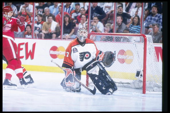 31 May 1997:  Goaltender Ron Hextall of the Philadelphia Flyers looks on during Game 1 of the Stanley Cup Finals against the Detroit Red Wings at the CoreStates Center in Philadelphia, Pennsylvania.  The Red Wings won the game, 4-2. Mandatory Credit: Rick