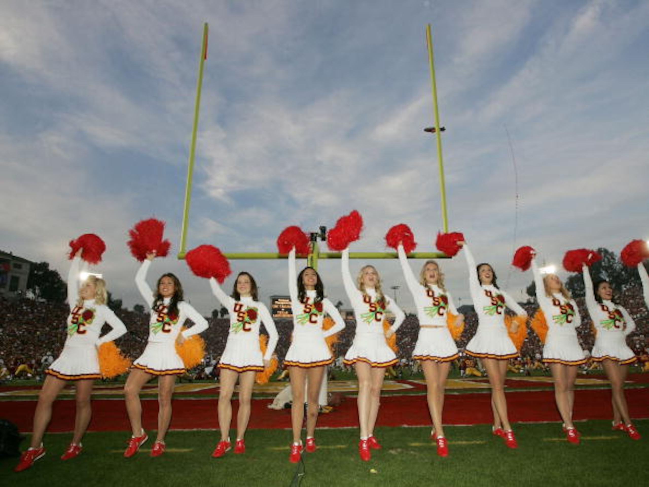 PASADENA, CA - JANUARY 04:  The USC Trojan cheerleaders perform before the start of the BCS National Championship Rose Bowl Game against the Texas Longhorns on January 4, 2006 in Pasadena, California.  (Photo by Stephen Dunn/Getty Images)