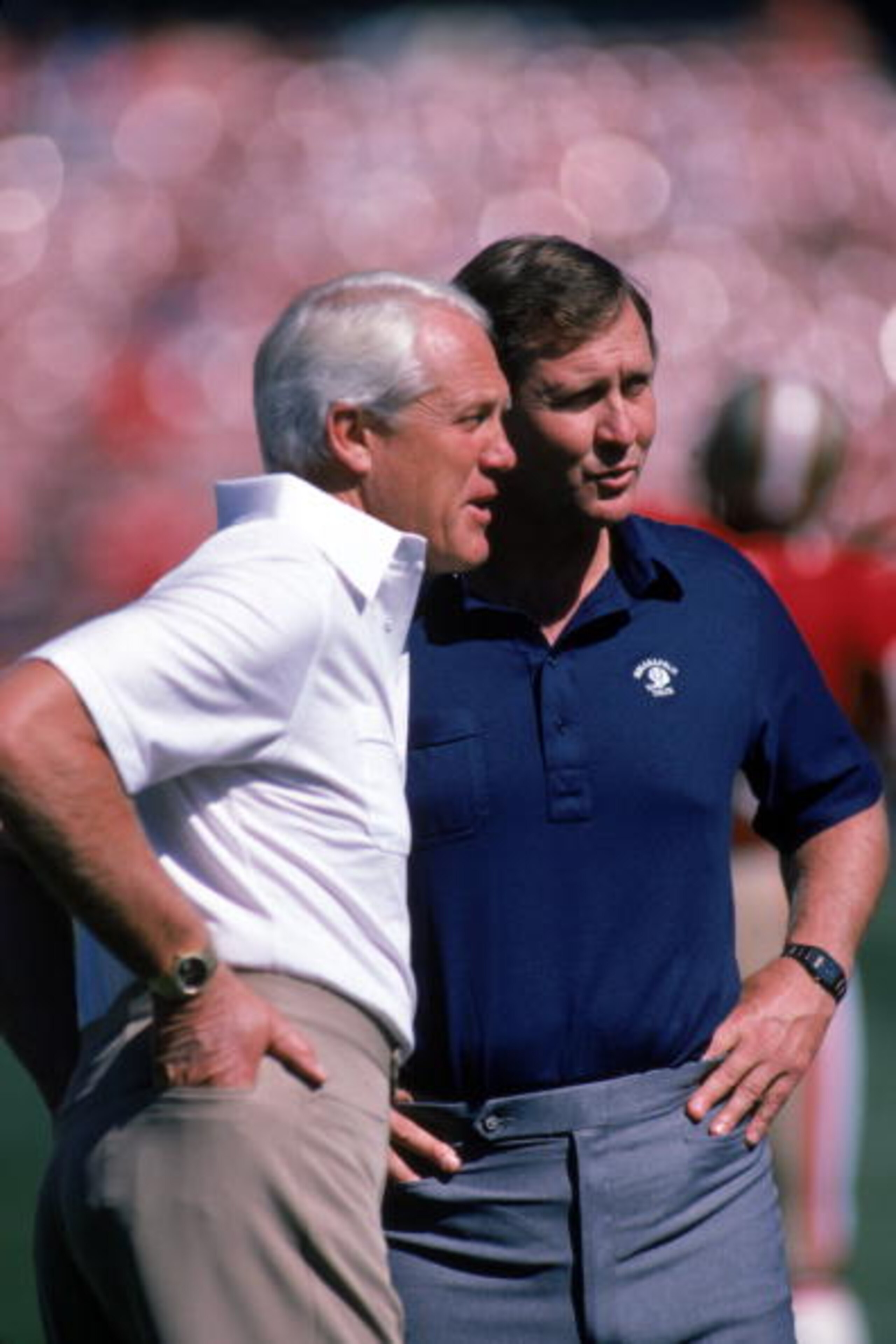 SAN FRANCISCO - OCTOBER 5:  (L-R) Head coach Bill Walsh of the San Francisco 49ers talks with Indianapolis Colts head coach Rod Dowhower prior to their game at Candlestick Park on October 5, 1986 in San Francisco, California.  The 49ers won 35-14.  (Photo