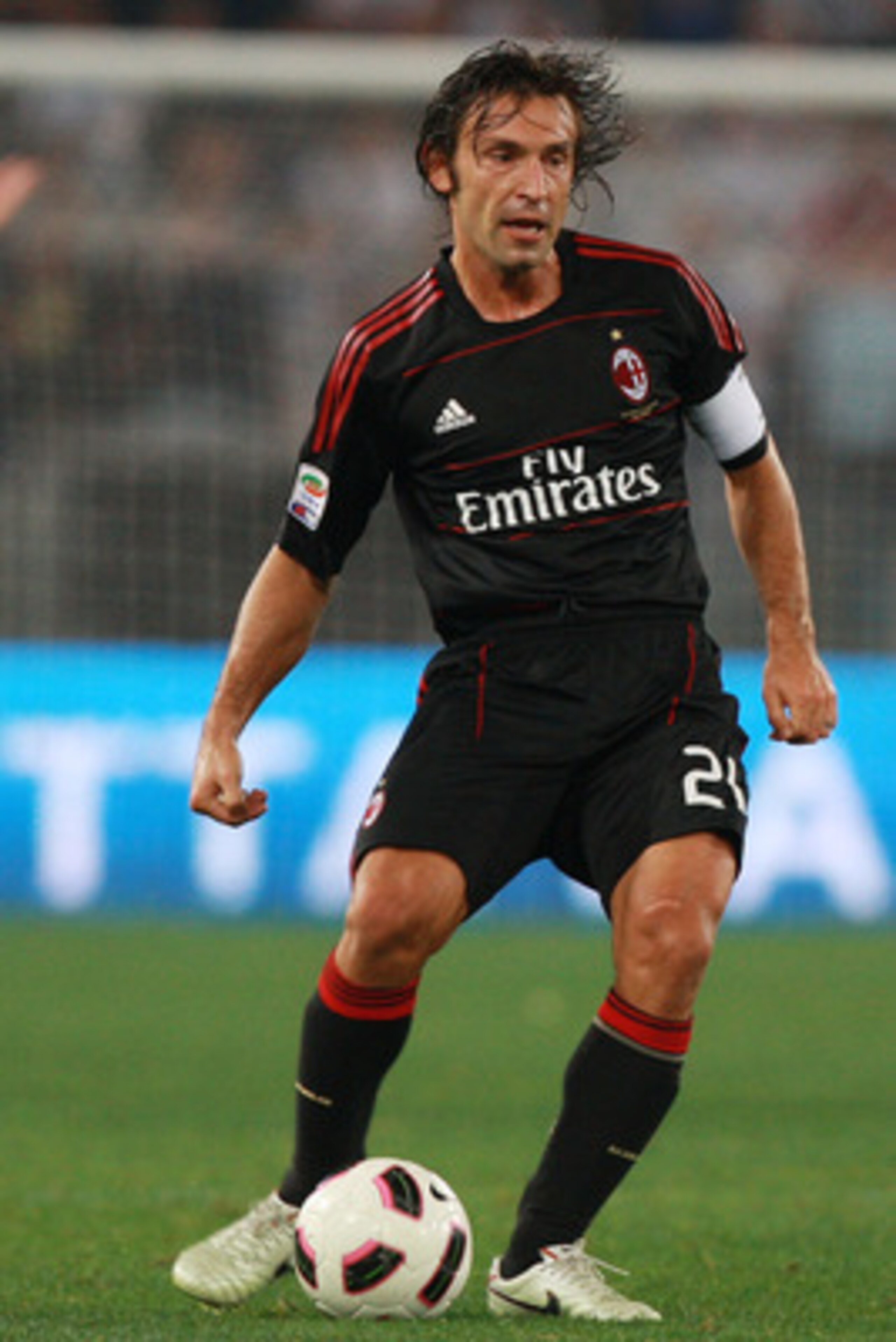 ROME - SEPTEMBER 22: Andrea Pirlo of AC Milan in action during the Serie A match between SS Lazio and AC Milan at Stadio Olimpico on September 22, 2010 in Rome, Italy.  (Photo by Paolo Bruno/Getty Images)