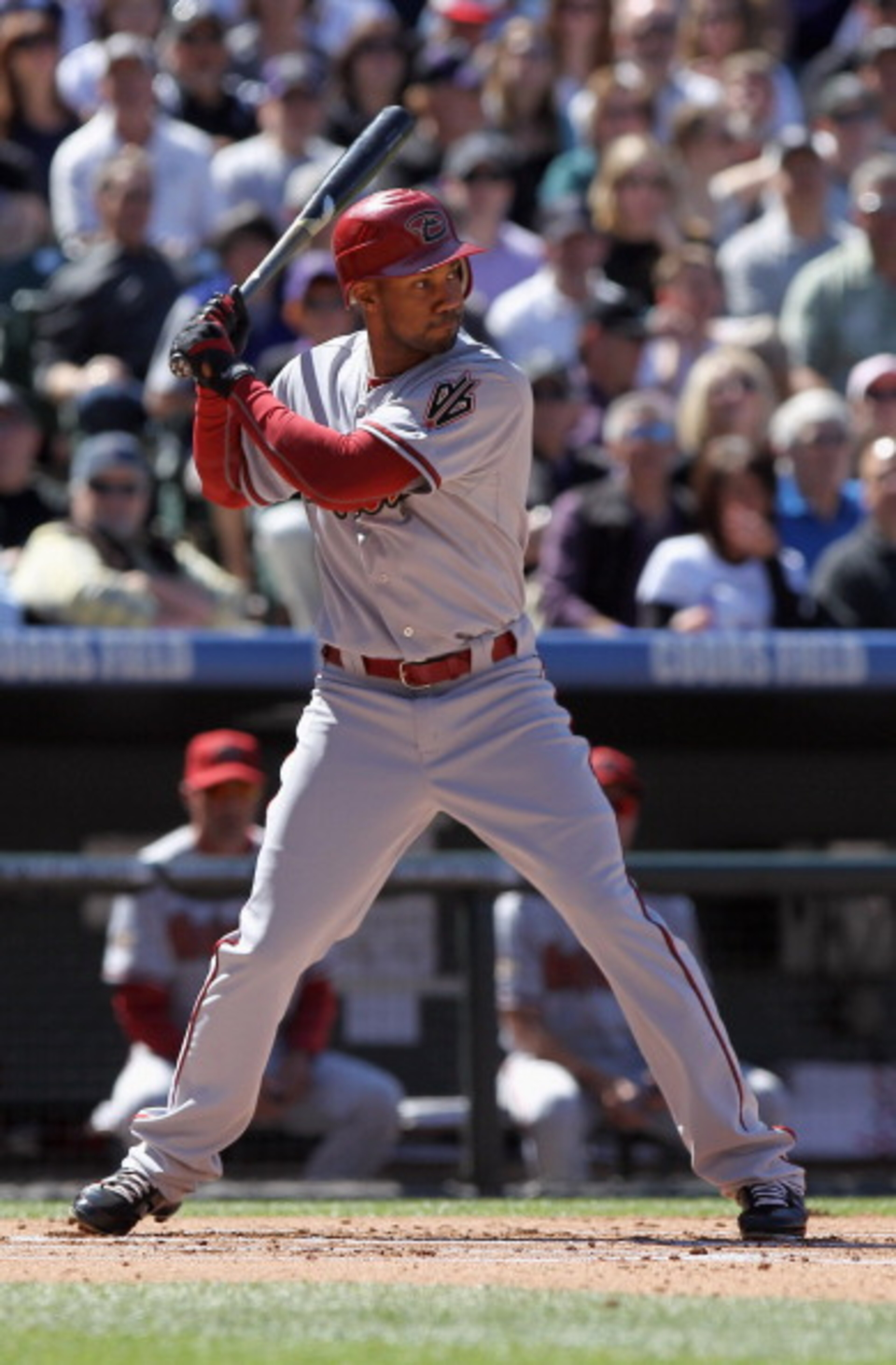 DENVER, CO - APRIL 01:  Chris Young #24 of the Arizona Diamondbacks takes an at bat against the Colorado Rockies during Opening Day at Coors Field on April 1, 2011 in Denver, Colorado. The Diamondbacks defeated the Rockies 7-6 in 11 innings.  (Photo by Do