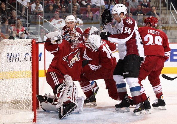 GLENDALE, AZ - APRIL 01:  Goaltender Ilya Bryzgalov #30 of the Phoenix Coyotes makes a glove save during the NHL game against the Colorado Avalanche at Jobing.com Arena on April 1, 2011 in Glendale, Arizona.  The Avalanche defeated the Coyotes 4-3 in an o