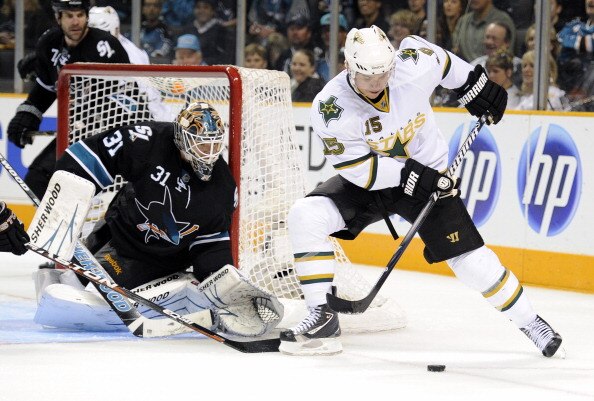 SAN JOSE, CA - MARCH 31: Antti Niemi #31 of  the San Jose Sharks defends his goal against Jamie Langenbrunner #15 of the Dallas Stars in the third period during an NHL hockey game at the HP Pavilion on March 31, 2011 in San Jose, California. The Sharks wo