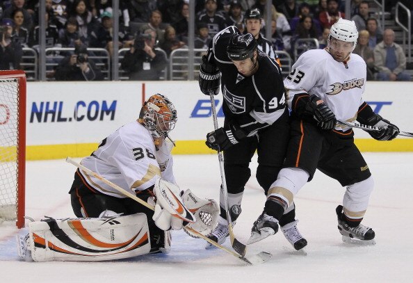 LOS ANGELES, CA - APRIL 09:  Ryan Smyth #94 of the Los Angeles Kings tips the puck in front of goaltender Dan Ellis # 38 of the Anaheim Ducks as Francois Beauchemin #23 of the Ducks defends in the second period at Staples Center on April 9, 2011 in Los An