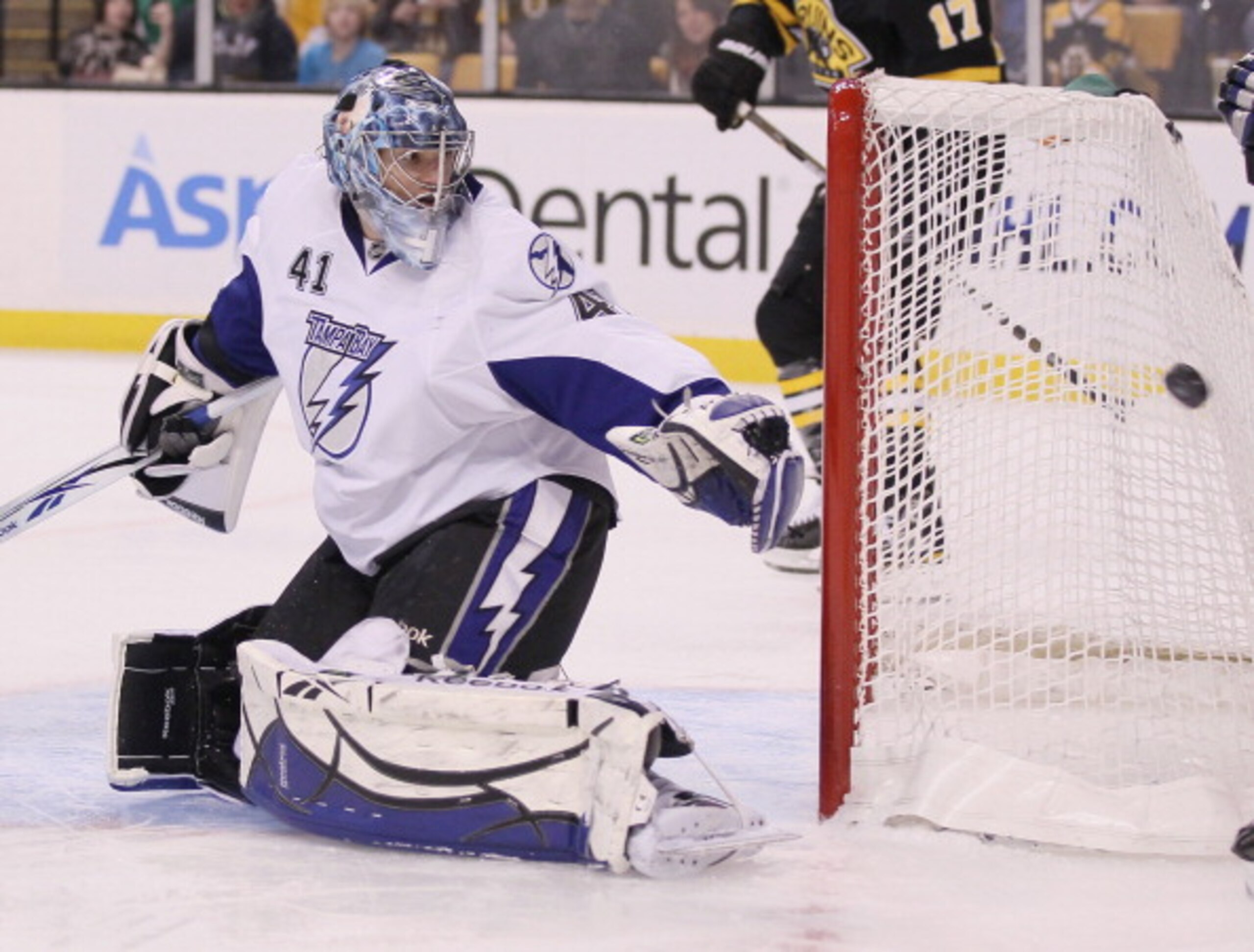 BOSTON, MA - MARCH 03:  Mike Smith #41 of the Tampa Bay Lightning stops a shot by the Boston Bruins in the first period on March 3, 2011 at the TD Garden in Boston, Massachusetts.  (Photo by Elsa/Getty Images)