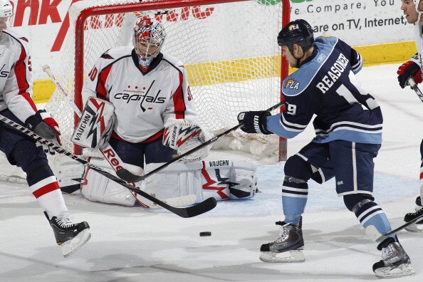 SUNRISE, FL - APRIL 9: Goaltender Michal Neuvirth #30 of the Washington Capitals stops a shot by Marty Reasoner #19 of the Florida Panthers during the third period on April 9, 2011 at the BankAtlantic Center in Sunrise, Florida. The Panthers defeated the