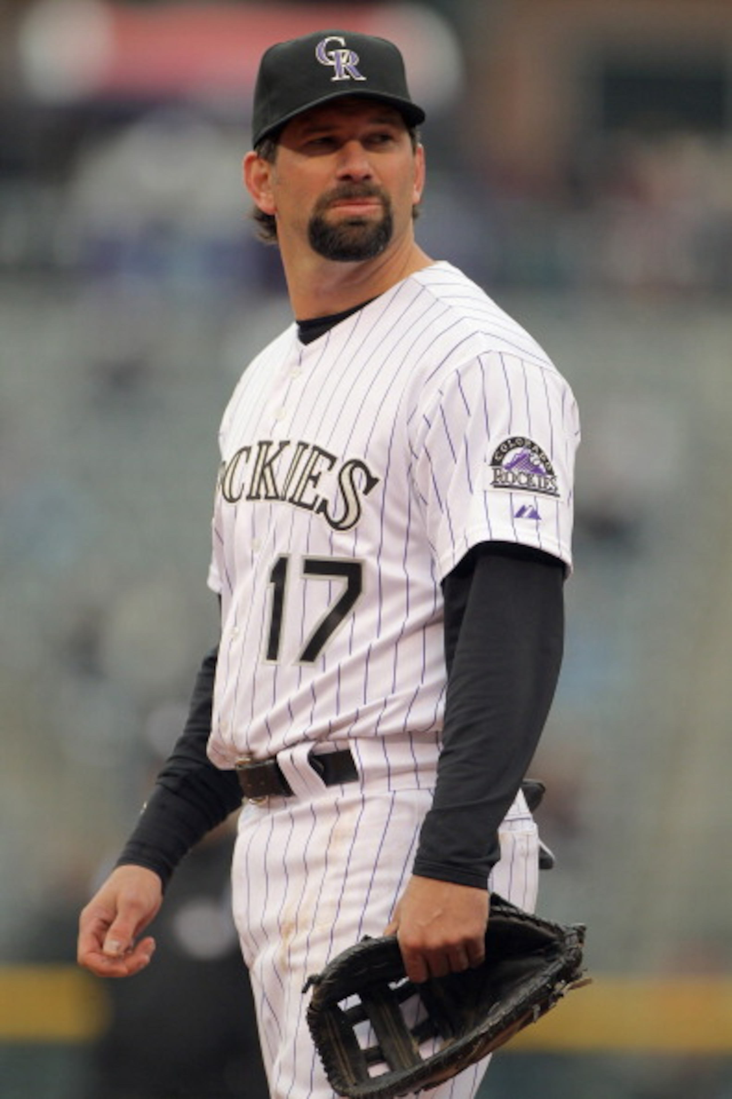 DENVER, CO - APRIL 06:  First baseman Todd Helton #17 of the Colorado Rockies plays defense against the Los Angeles Dodgers at Coors Field on April 6, 2011 in Denver, Colorado.  (Photo by Doug Pensinger/Getty Images)