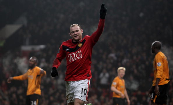 MANCHESTER, ENGLAND - JANUARY 23:  Wayne Rooney of Manchester United celebrates scoring his hat-trick during the Barclays Premier League match between Manchester United and Hull City at Old Trafford on January 23, 2010 in Manchester, England.  (Photo by J