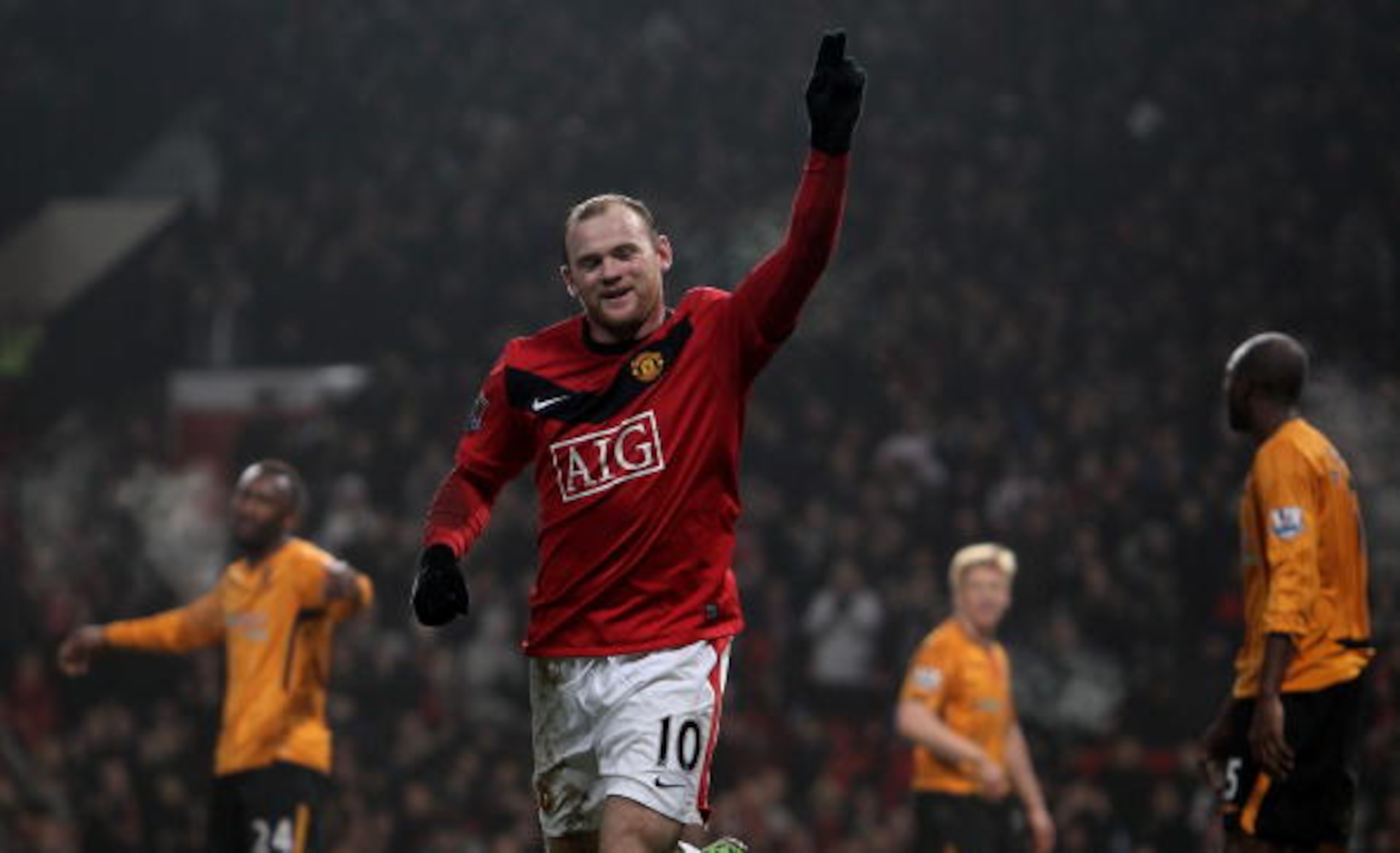 MANCHESTER, ENGLAND - JANUARY 23:  Wayne Rooney of Manchester United celebrates scoring his hat-trick during the Barclays Premier League match between Manchester United and Hull City at Old Trafford on January 23, 2010 in Manchester, England.  (Photo by J