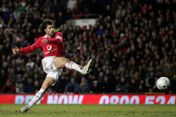 MANCHESTER, UNITED KINGDOM - JANUARY 25:  Ruud van Nistlerooy of Manchester shoots on goal during the Carling Cup Semi Final Second Leg between Manchester United and Blackburn Rovers at Old Trafford on January 25, 2006 in Manchester England.  (Photo by Cl