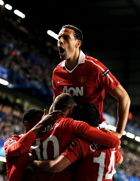 LONDON, ENGLAND - APRIL 06:  Rio Ferdinand (T) of Manchester United celebrates after teammate Wayne Rooney #10 of Manchester United scores the opening goal during the UEFA Champions League quarter final first leg match between Chelsea and Manchester Unite