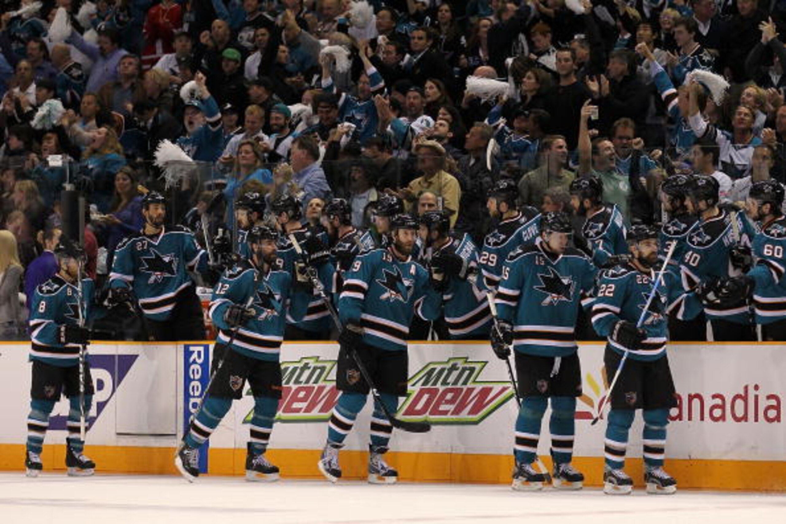 SAN JOSE, CA - MAY 18:  (2nd L) Patrick Marleau #12 of the San Jose Sharks celebrates with his teammates after his second period goal against the Chicago Blackhawks in Game Two of the Western Conference Finals during the 2010 NHL Stanley Cup Playoffs at H