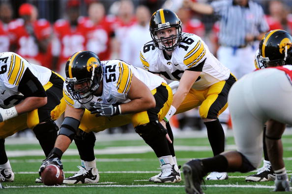 COLUMBUS, OH - NOVEMBER 14:  Quarterback James Vandenberg #16 of the Iowa Hawkeyes takes the snap from center against the Ohio State Buckeyes at Ohio Stadium on November 14, 2009 in Columbus, Ohio.  (Photo by Jamie Sabau/Getty Images)