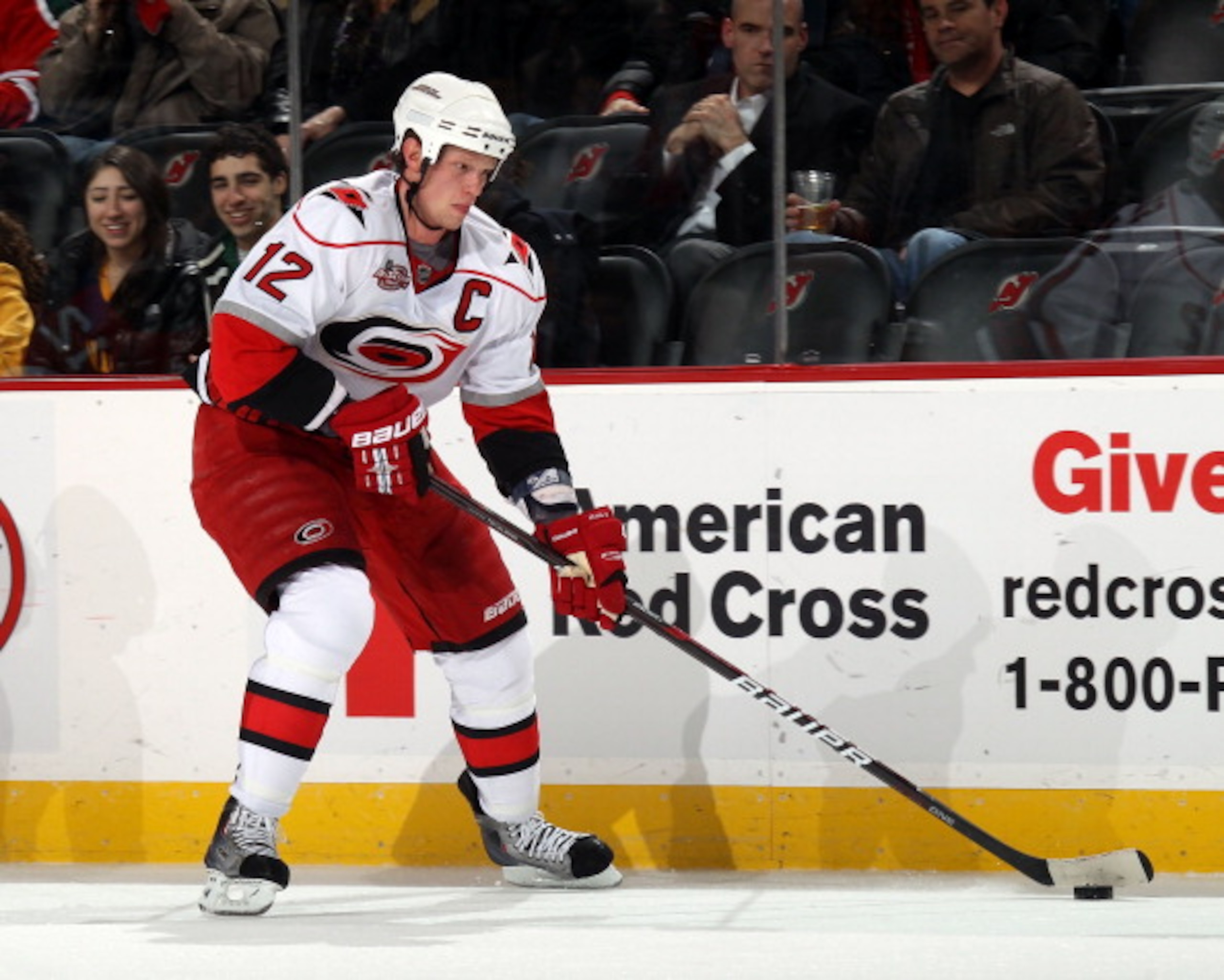 NEWARK, NJ - FEBRUARY 16:  Eric Staal #12 of the Carolina Hurricanes skates against the New Jersey Devils at the Prudential Center on February 16, 2011 in Newark, New Jersey.  (Photo by Bruce Bennett/Getty Images)