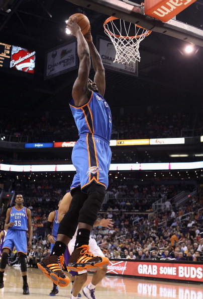 PHOENIX, AZ - MARCH 30:  Kendrick Perkins #5 of the Oklahoma City Thunder slam dunks during the NBA game against the Phoenix Suns at US Airways Center on March 30, 2011 in Phoenix, Arizona. The Thunder defeated the Suns 116-98.   NOTE TO USER: User expres