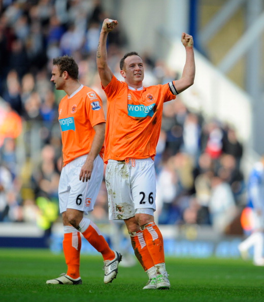 BLACKBURN, ENGLAND - MARCH 19:  Charlie Adam of Blackpool celebrates after scoring to make it 1-0 during the Barclays Premier League match between Blackburn Rovers and Blackpool at Ewood Park on March 19, 2011 in Blackburn, England.  (Photo by Michael Reg