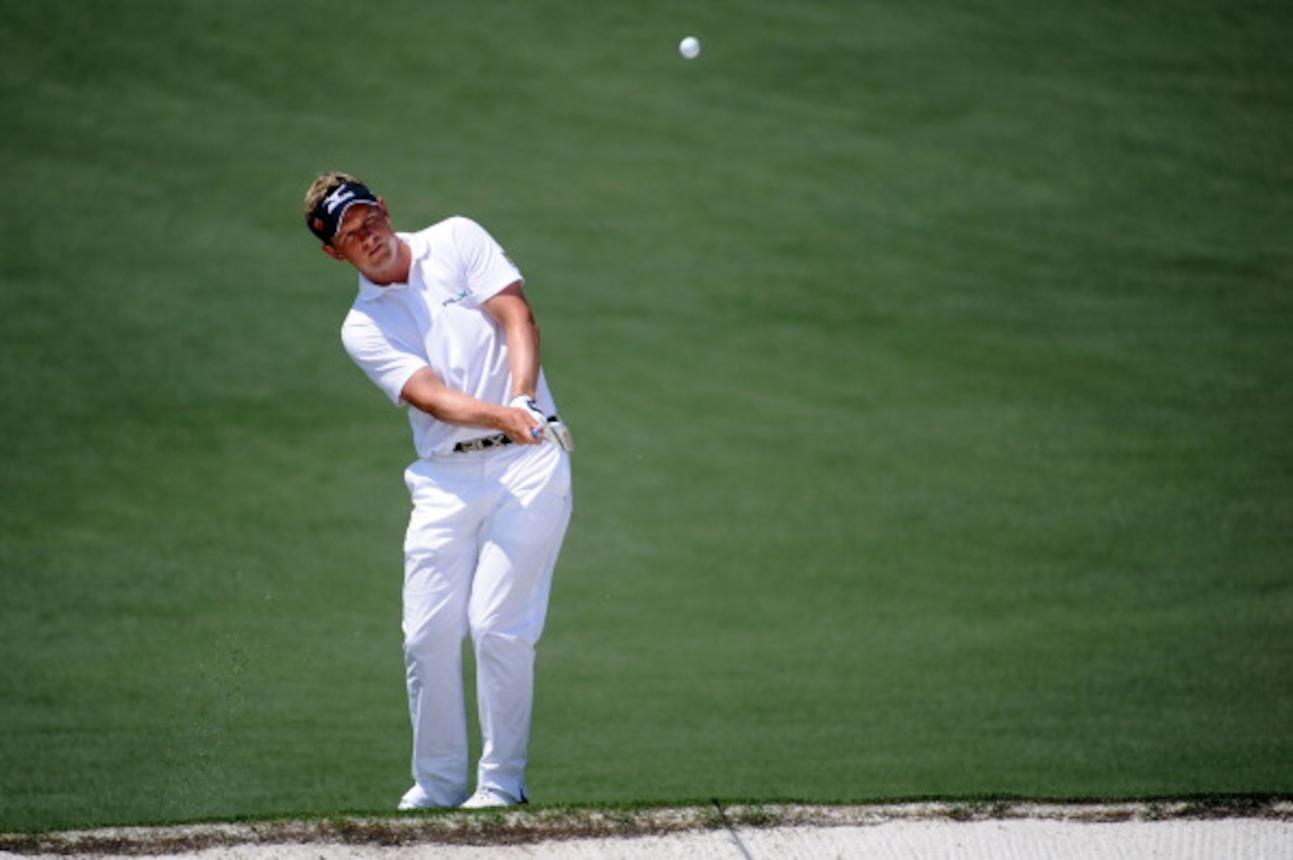 AUGUSTA, GA - APRIL 10:  Luke Donald of England hits a chip shot during the final round of the 2011 Masters Tournament at Augusta National Golf Club on April 10, 2011 in Augusta, Georgia.  (Photo by Harry How/Getty Images)