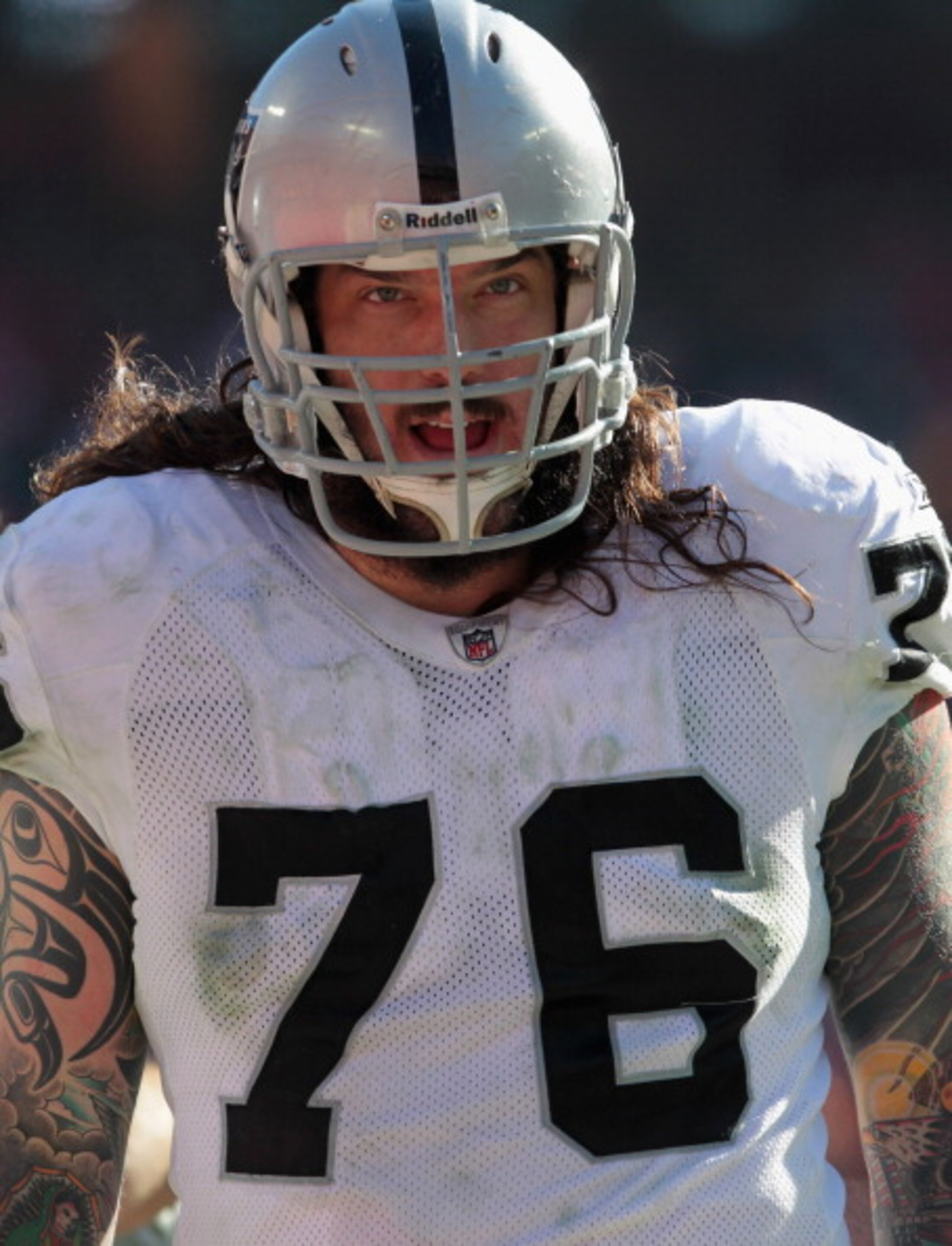 KANSAS CITY, MO - JANUARY 02:  Robert Gallery #76 of the Oakland Raiders walks onto the field during the game against the Kansas City Chiefs on January 2, 2011 at Arrowhead Stadium in Kansas City, Missouri.  (Photo by Jamie Squire/Getty Images)