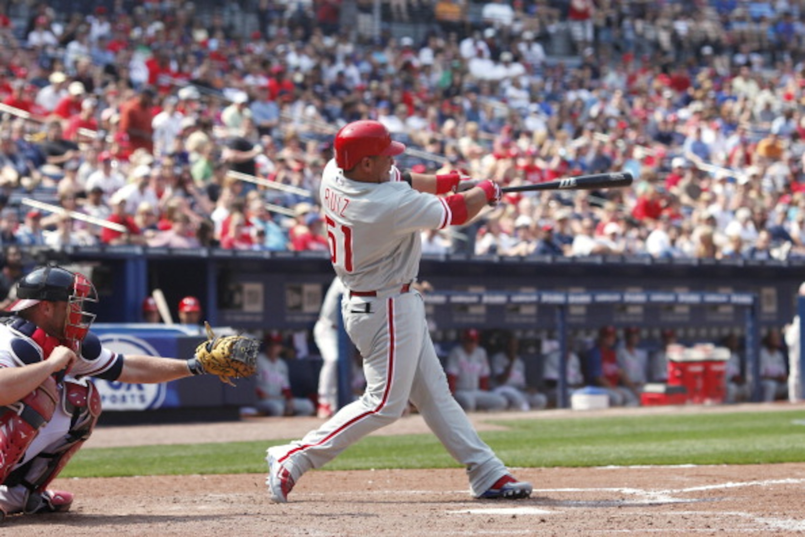 ATLANTA, GA - APRIL 9: Carlos Ruiz #51 of the Philadelphia Phillies drives in a run in the 8th inning with a double against the Atlanta Braves at Turner Field on April 9, 2011 in Atlanta, Georgia. The Phillies won 10-2. (Photo by Joe Robbins/Getty Images)
