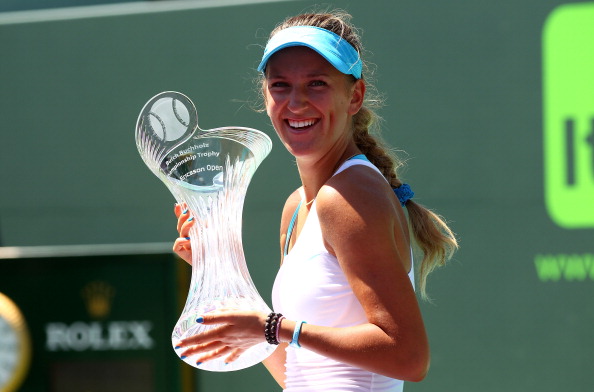 KEY BISCAYNE, FL - APRIL 02:  Victoria Azarenka of Belarus celebrates with the trophy after she her match against Maria Sharapova of Russia during the women's singles championship at the Sony Ericsson Open at Crandon Park Tennis Center on April 2, 2011 in