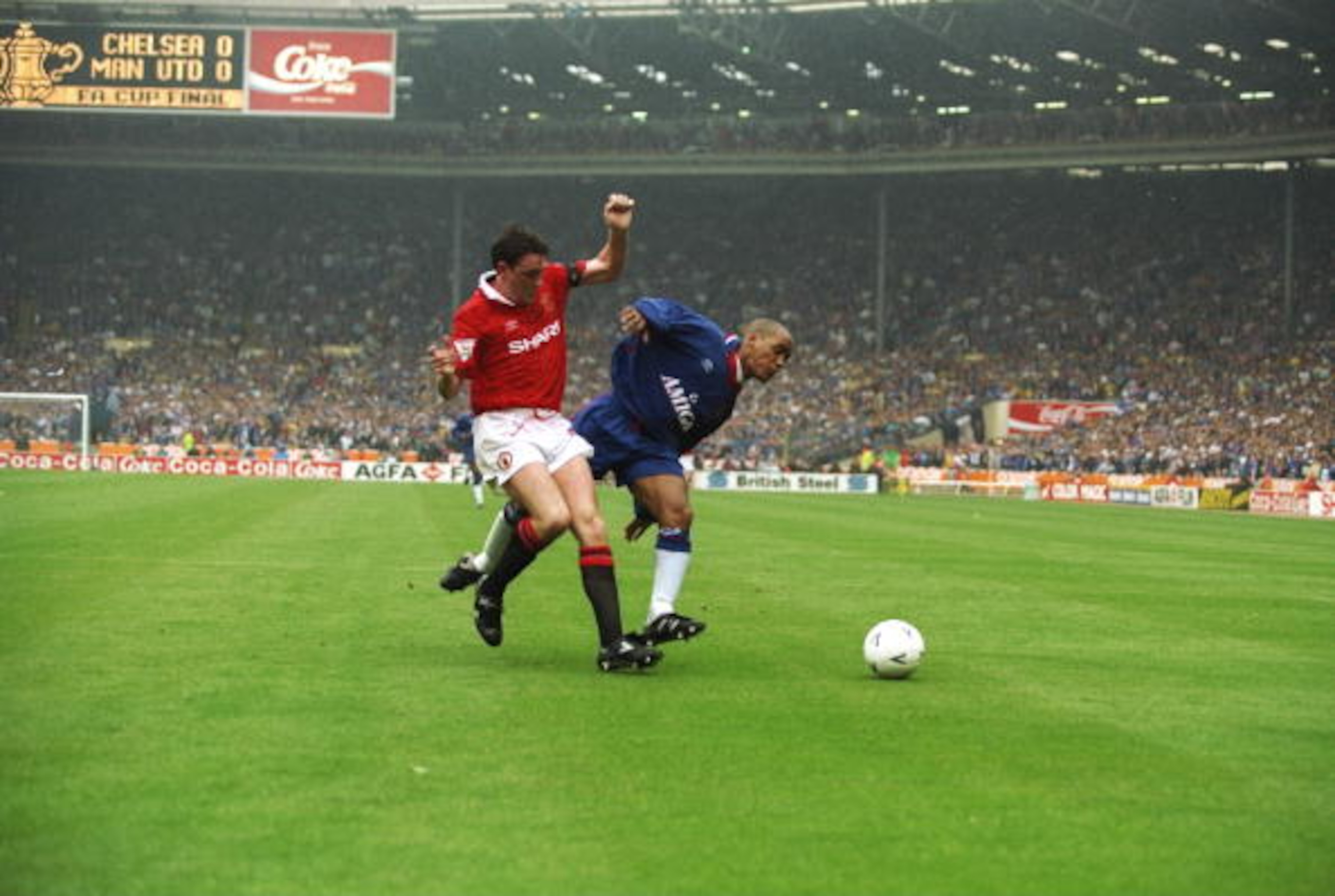 14 May 1994:   Mark Stein (right) of Chelsea tackles Steve Bruce (left) of Manchester United during the FA Cup Final at Wembley Stadium in London. Manchester United won the match 4-0. \ Mandatory Credit: Allsport UK /Allsport
