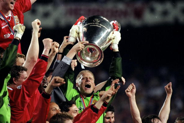 26 May 1999:  Peter Schmeichel captain of Manchester United in his final game lifts the European Cup after United beat Bayern Munich in the European Champions League Final in the Nou Camp Stadium, Barcelona, Spain. Manchester United won 2 - 1 with both Un