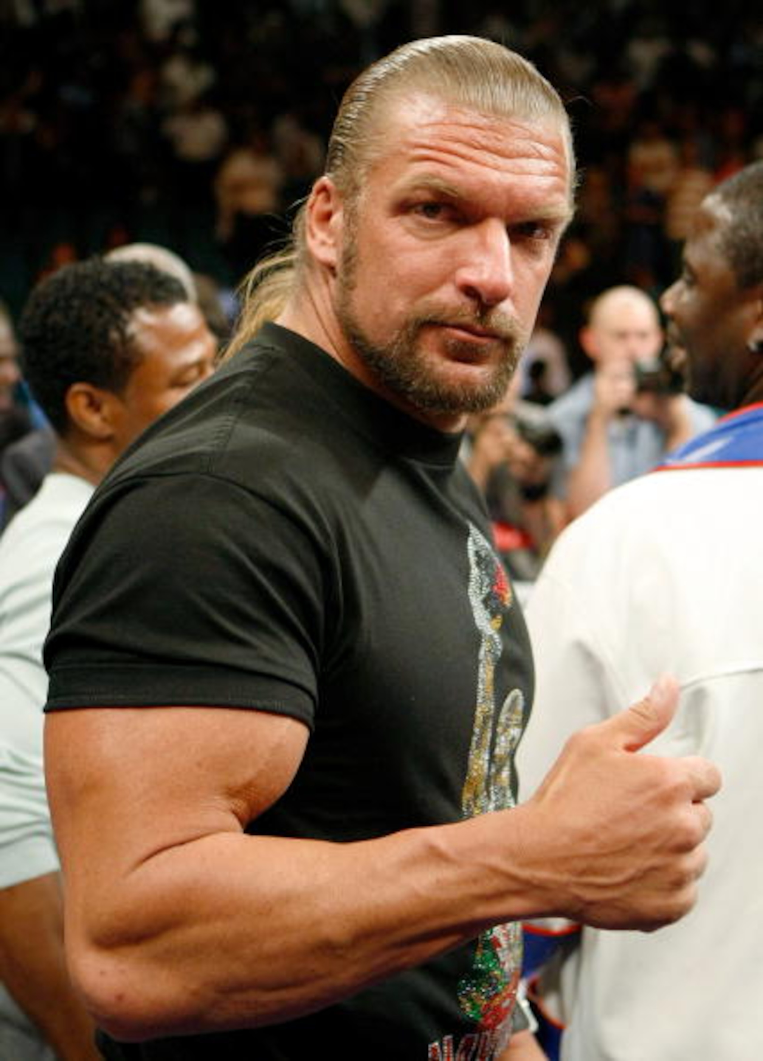 LAS VEGAS - SEPTEMBER 19: WWE wrestler Triple H poses in the ring after Floyd Mayweather Jr. defeated Juan Manuel Marquez in a unanimous decision at the MGM Grand Garden Arena September 19, 2009 in Las Vegas, Nevada. (Photo by Ethan Miller/Getty Images) LAS VEGAS - SEPTEMBER 19: WWE wrestler Triple H poses in the ring after Floyd Mayweather Jr. defeated Juan Manuel Marquez in a unanimous decision at the MGM Grand Garden Arena September 19, 2009 in Las Vegas, Nevada. (Photo by Ethan Miller/Getty Images)