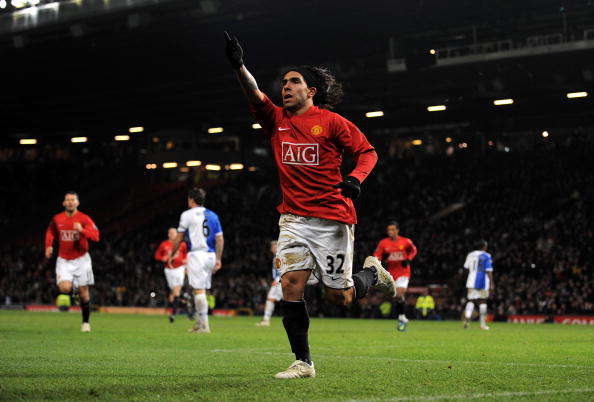 MANCHESTER, UNITED KINGDOM - DECEMBER 03:  Carlos Tevez of Manchester United celebrates after scoring from the penalty spot during the Carling Cup Quarter Final match between Manchester United and Blackburn Rovers at Old Trafford on December 3, 2008 in Ma