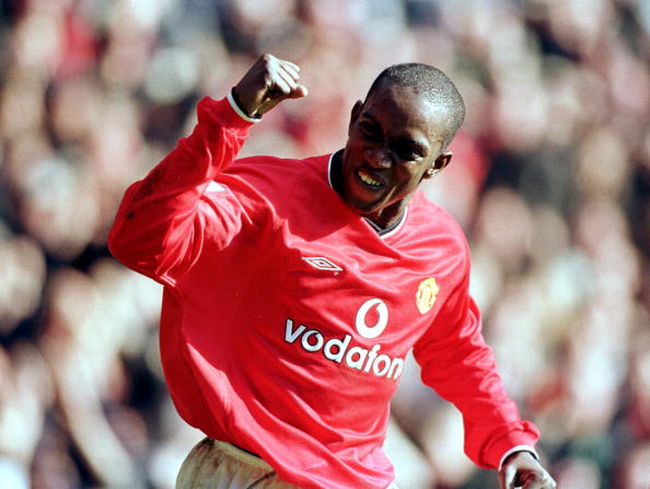 25 Feb 2001: Dwight Yorke of Man Utd celebrates after scoring his second goal during the FA Carling Premiership match between Manchester United and  Arsenal at Old Trafford, Manchester. Mandatory Credit: Gary M. Prior/ALLSPORT