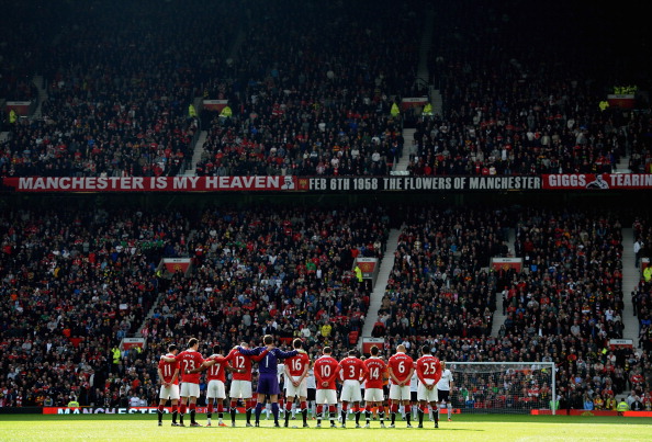 MANCHESTER, ENGLAND - MARCH 19:  The Manchester United players observe a minute's silence for those who lost their lives during the earthquake and tsunami in Japan before the Barclays Premier League match between Manchester United and Bolton Wanderers at 