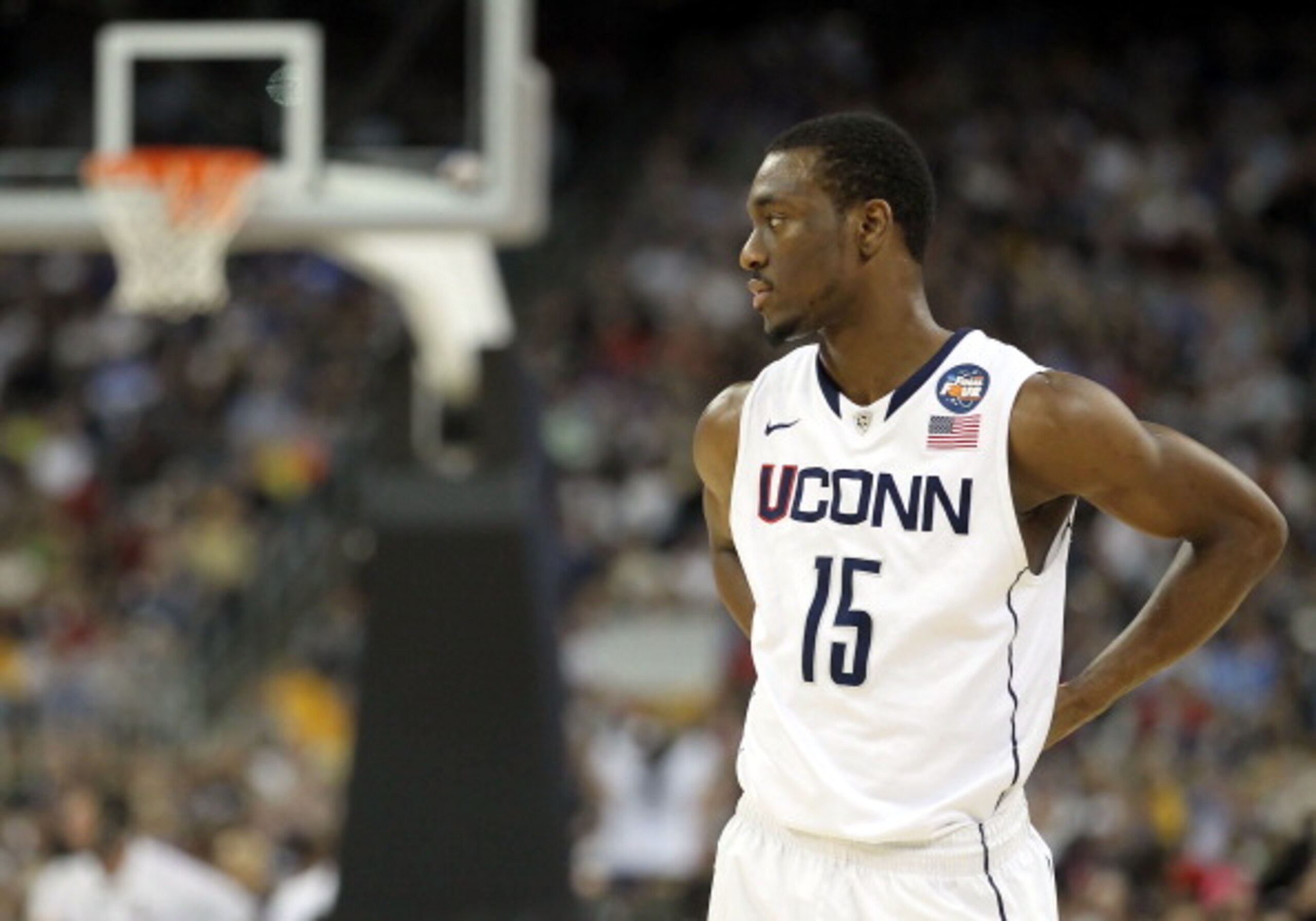 HOUSTON, TX - APRIL 04: Kemba Walker #15 of the Connecticut Huskies looks on against the Butler Bulldogs during the National Championship Game of the 2011 NCAA Division I Men's Basketball Tournament at Reliant Stadium on April 4, 2011 in Houston, Texas. HOUSTON, TX - APRIL 04: Kemba Walker #15 of the Connecticut Huskies looks on against the Butler Bulldogs during the National Championship Game of the 2011 NCAA Division I Men's Basketball Tournament at Reliant Stadium on April 4, 2011 in Houston, Texas.