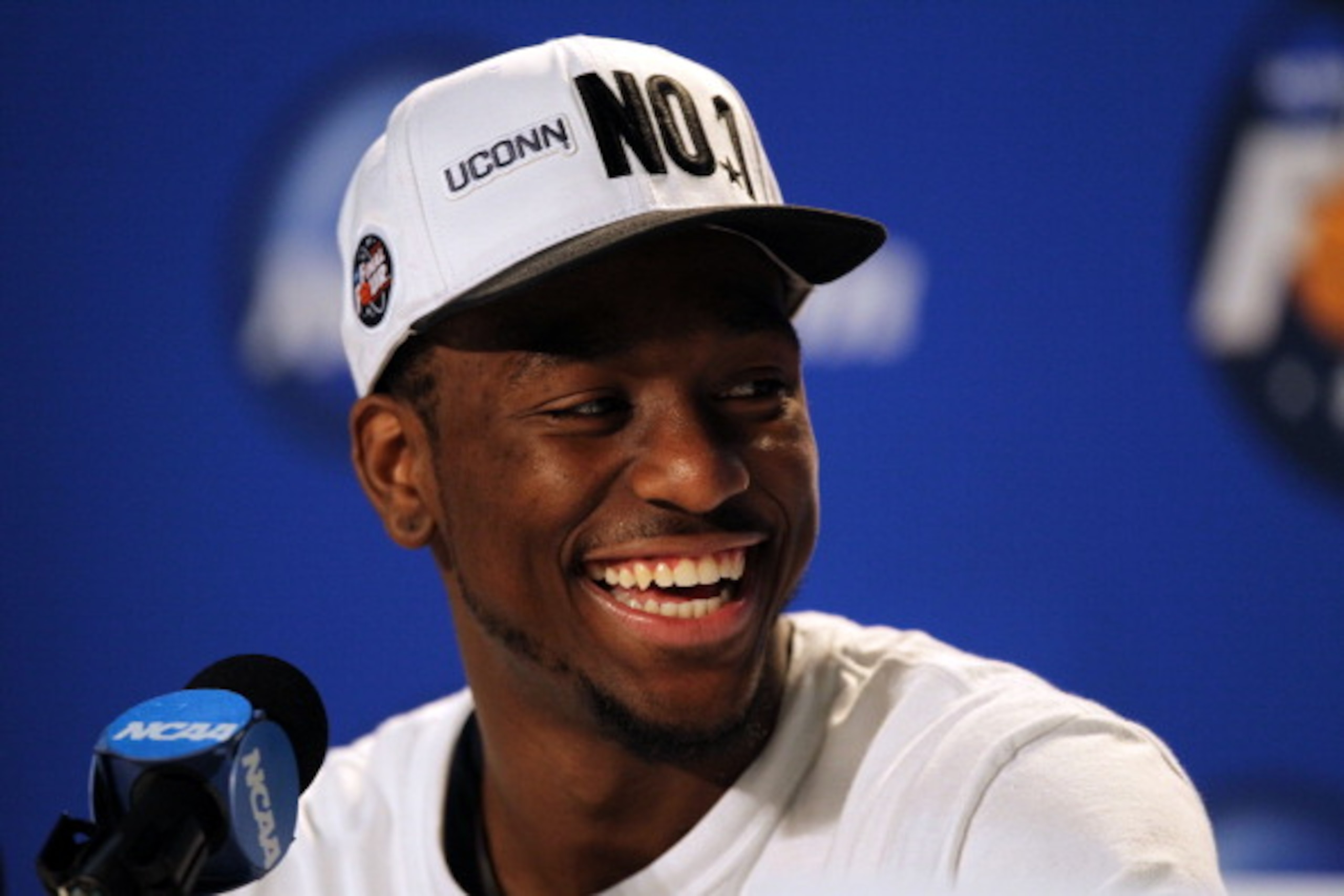 HOUSTON, TX - APRIL 04: Kemba Walker #15 of the Connecticut Huskies speaks to the media after defeating the Butler Bulldogs to win the National Championship Game of the 2011 NCAA Division I Men's Basketball Tournament at Reliant Stadium on April 4, 2011 HOUSTON, TX - APRIL 04: Kemba Walker #15 of the Connecticut Huskies speaks to the media after defeating the Butler Bulldogs to win the National Championship Game of the 2011 NCAA Division I Men's Basketball Tournament at Reliant Stadium on April 4, 2011