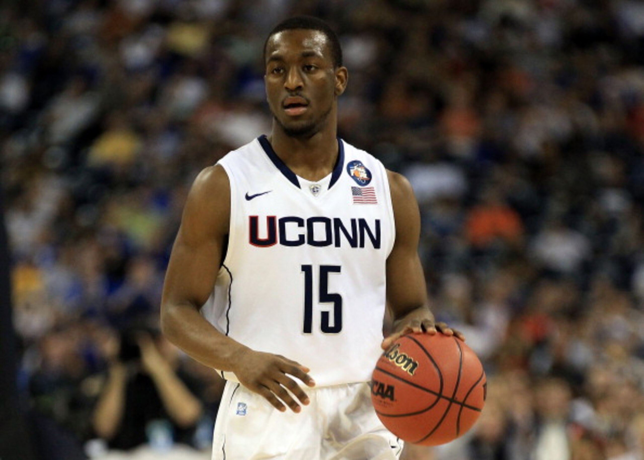 HOUSTON, TX - APRIL 02: Kemba Walker #15 of the Connecticut Huskies handles the ball against the Kentucky Wildcats during the National Semifinal game of the 2011 NCAA Division I Men's Basketball Championship at Reliant Stadium on April 2, 2011 in Houston HOUSTON, TX - APRIL 02: Kemba Walker #15 of the Connecticut Huskies handles the ball against the Kentucky Wildcats during the National Semifinal game of the 2011 NCAA Division I Men's Basketball Championship at Reliant Stadium on April 2, 2011 in Houston