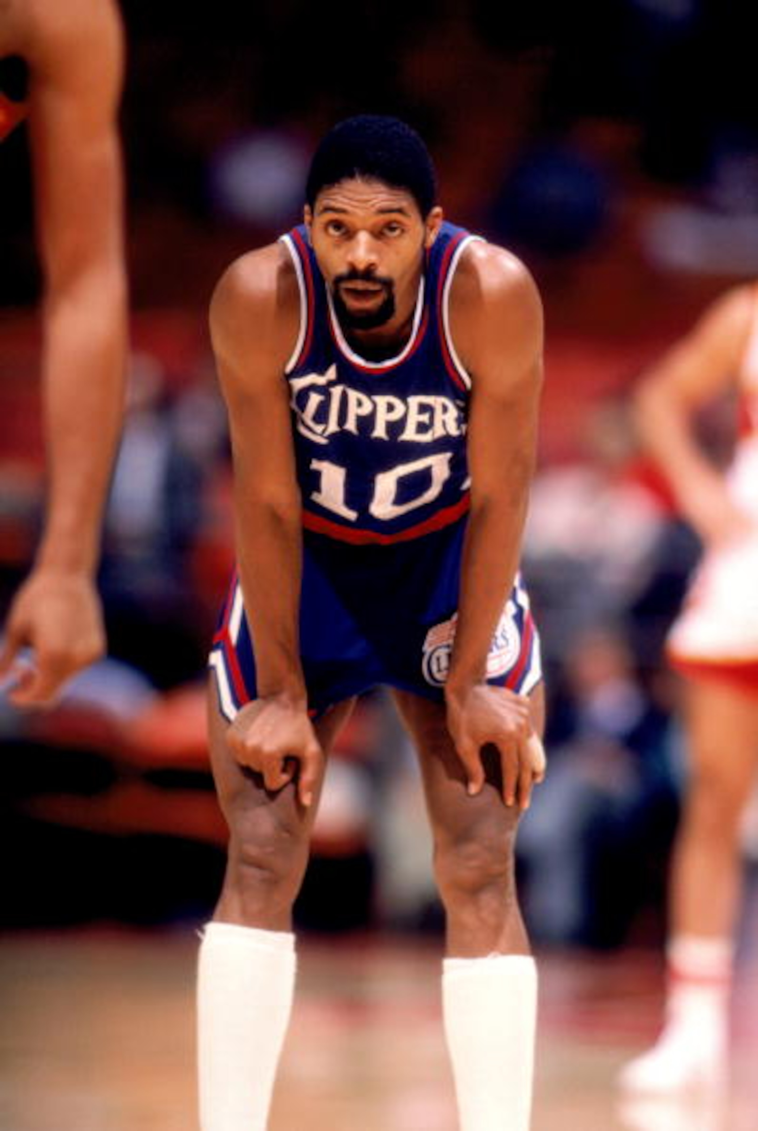 NOVEMBER 1983: Norm Nixon #10 of the San Diego Clippers rest on the court during a game in November, 1983. (Photo by Scott Cunningham/Getty Images)
