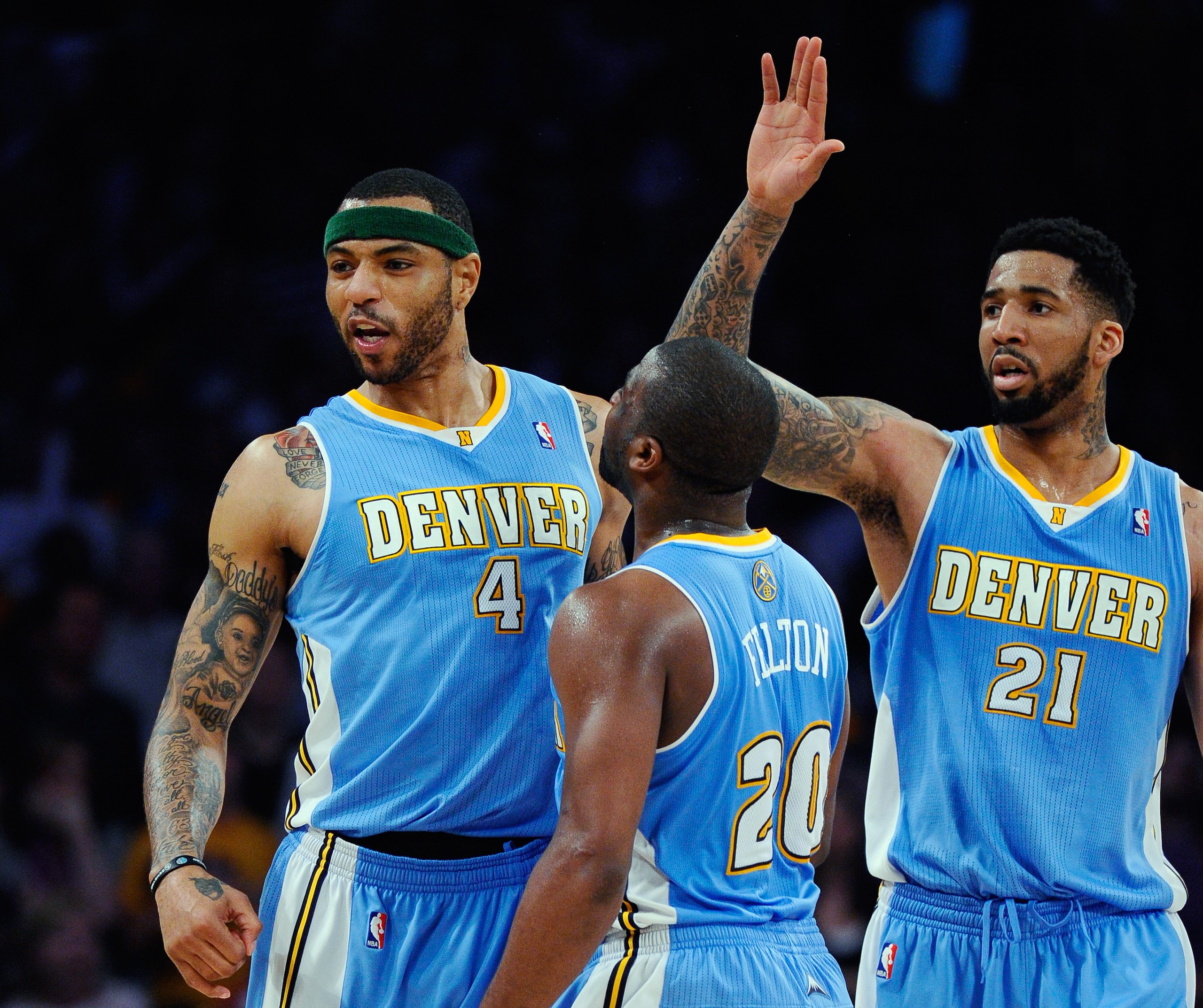 LOS ANGELES, CA - APRIL 03: Kenyon Martin #4 of the Denver Nuggets celebrates with teammates Raymond Felton #20 and Wilson Chandler #21 after scoring a basket against the Los Angeles Lakers during the NBA basketball game at Staples Center on April 3, 201 LOS ANGELES, CA - APRIL 03: Kenyon Martin #4 of the Denver Nuggets celebrates with teammates Raymond Felton #20 and Wilson Chandler #21 after scoring a basket against the Los Angeles Lakers during the NBA basketball game at Staples Center on April 3, 201