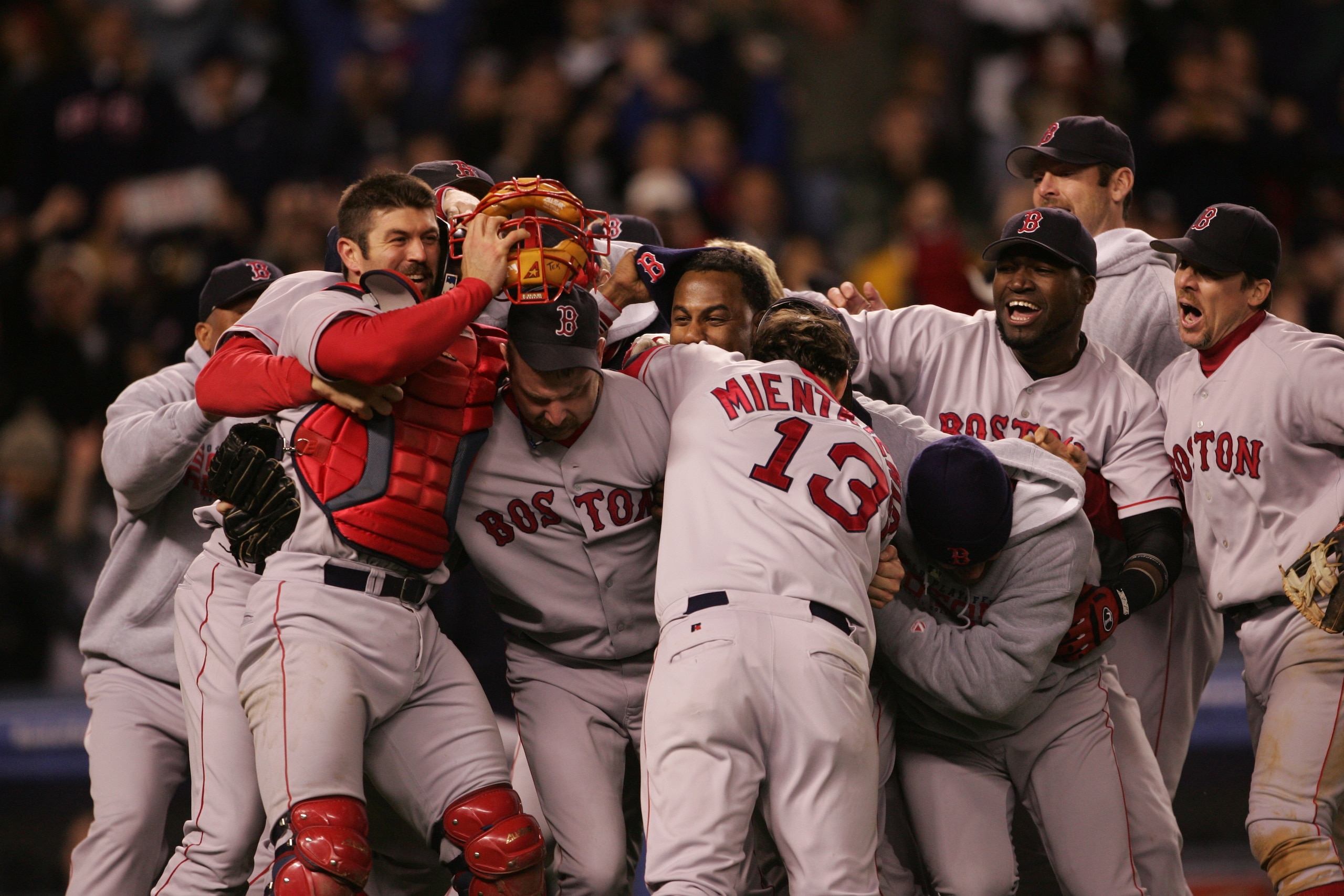 NEW YORK - OCTOBER 20:  The Boston Red Sox celebrate after defeating the New York Yankees 10-3 in game seven of the American League Championship Series on October 20, 2004 at Yankee Stadium in the Bronx borough of New York City. (Photo by Doug Pensinger/G