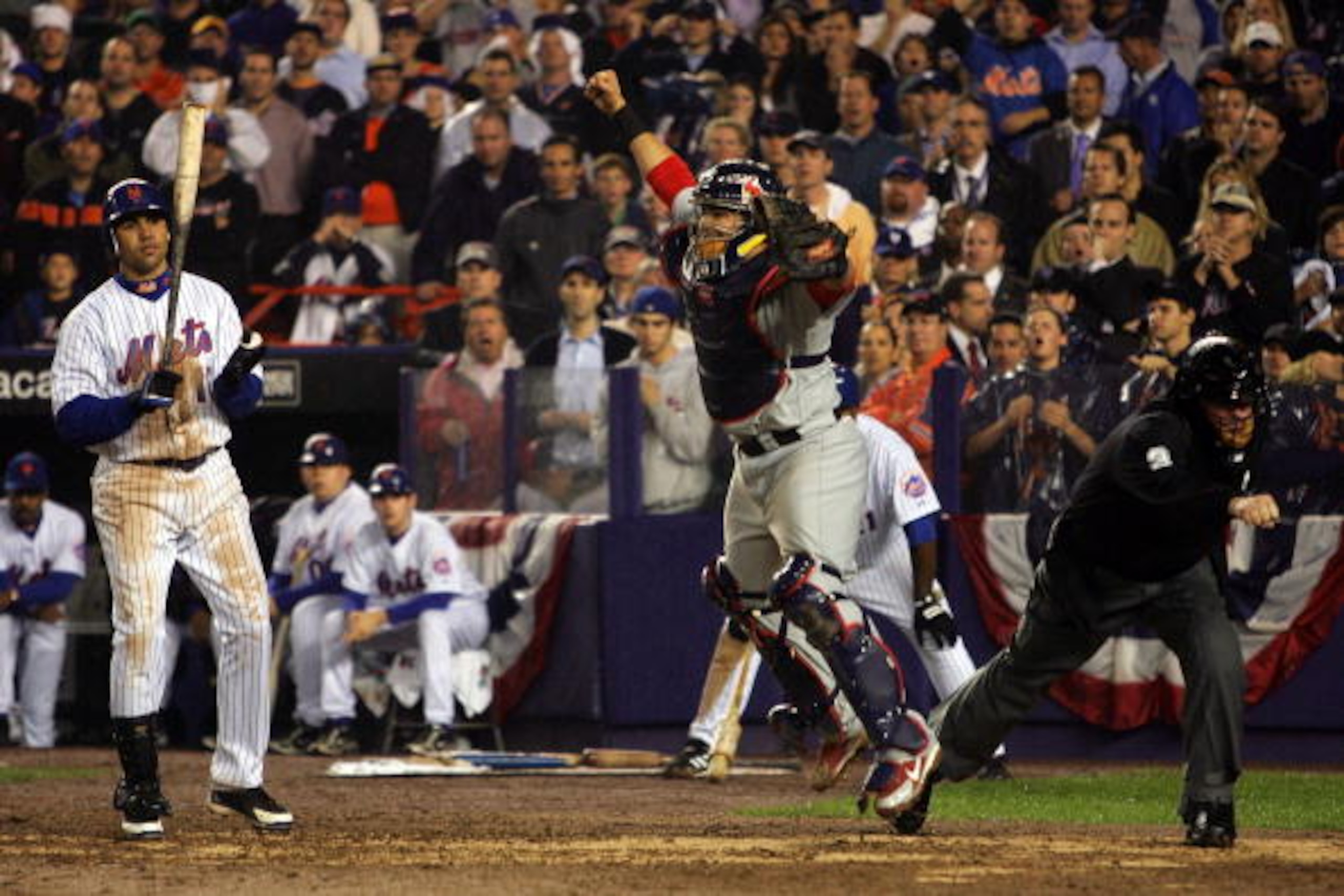 NEW YORK - OCTOBER 19:  Catcher Yadier Molina #4 of the St. Louis Cardinals reacts after Carlos Beltran #15 of the New York Mets stikes out to end game seven of the NLCS at Shea Stadium on October 19, 2006 in the Flushing neighborhood of the Queens boroug