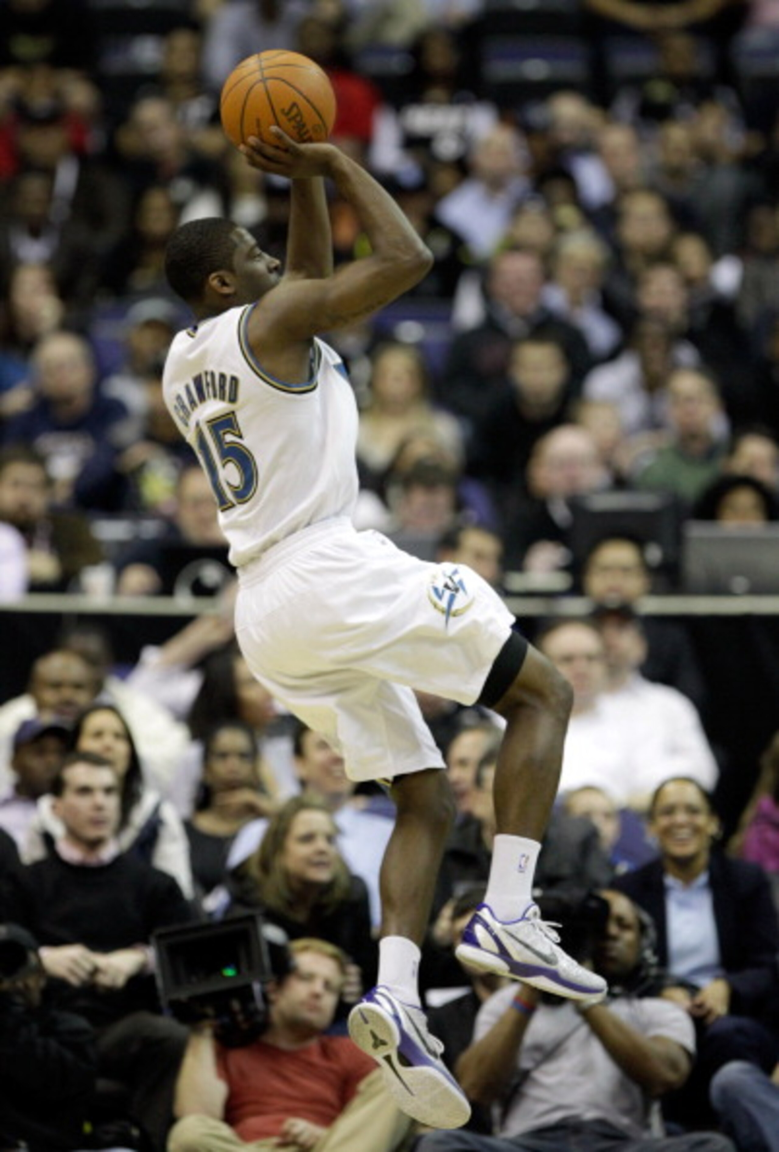 WASHINGTON, DC - MARCH 30: Jordan Crawford #15 of the Washington Wizards puts up a shot against the Miami Heat at the Verizon Center on March 30, 2011 in Washington, DC. NOTE TO USER: User expressly acknowledges and agrees that, by downloading and/or usin WASHINGTON, DC - MARCH 30: Jordan Crawford #15 of the Washington Wizards puts up a shot against the Miami Heat at the Verizon Center on March 30, 2011 in Washington, DC. NOTE TO USER: User expressly acknowledges and agrees that, by downloading and/or usin