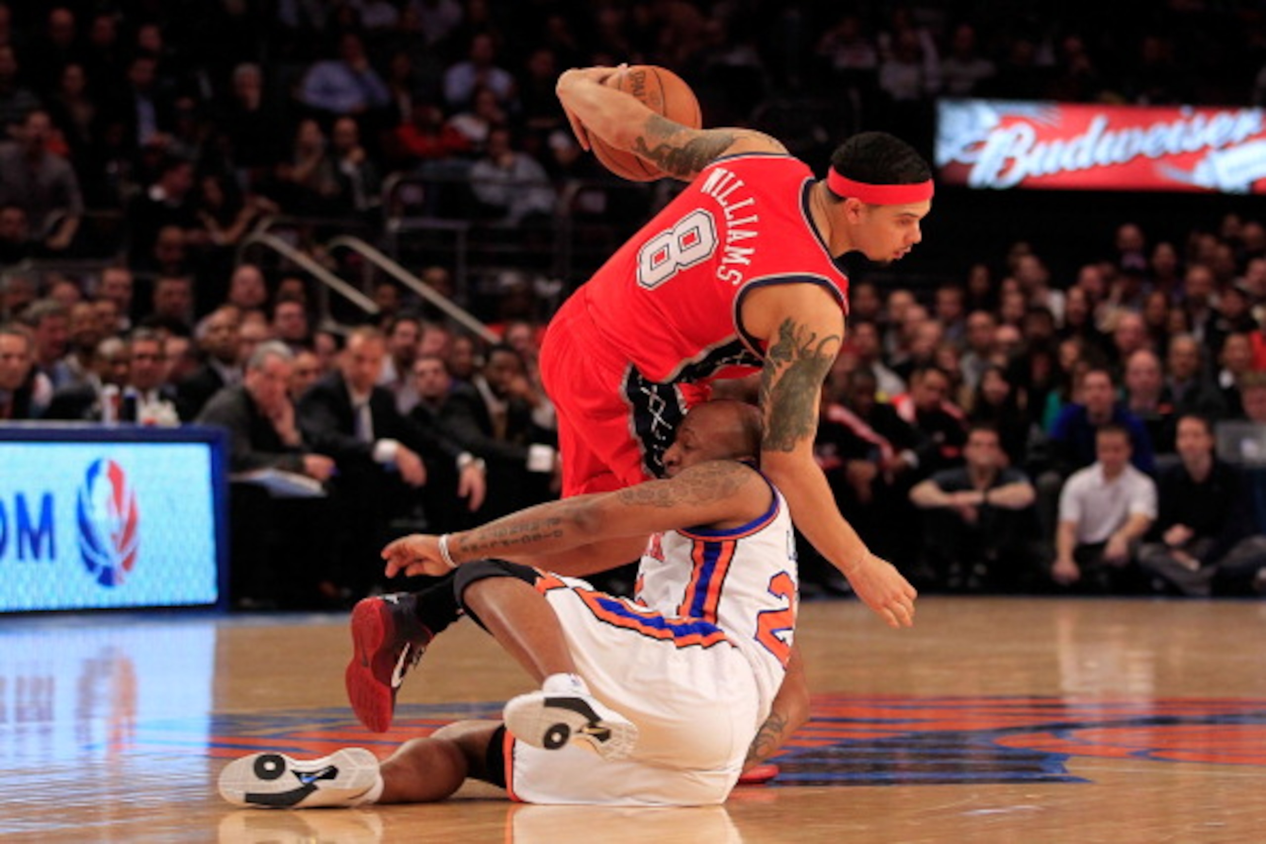 NEW YORK, NY - MARCH 30: Deron Williams #8 of the New Jersey Nets drives against Anthony Carter#25 of the New York Knicks at Madison Square Garden on March 30, 2011 in New York City. NOTE TO USER: User expressly acknowledges and agrees that, by downloadi NEW YORK, NY - MARCH 30: Deron Williams #8 of the New Jersey Nets drives against Anthony Carter#25 of the New York Knicks at Madison Square Garden on March 30, 2011 in New York City. NOTE TO USER: User expressly acknowledges and agrees that, by downloadi