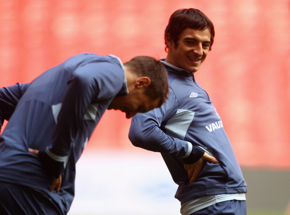LONDON, ENGLAND - MARCH 28:  Leighton Baines (R) and Phil Jagielka of England share a joke during the England training session ahead of the International Friendly match against Ghana at Wembley Stadium on March 28, 2011 in London, England.  (Photo by Juli