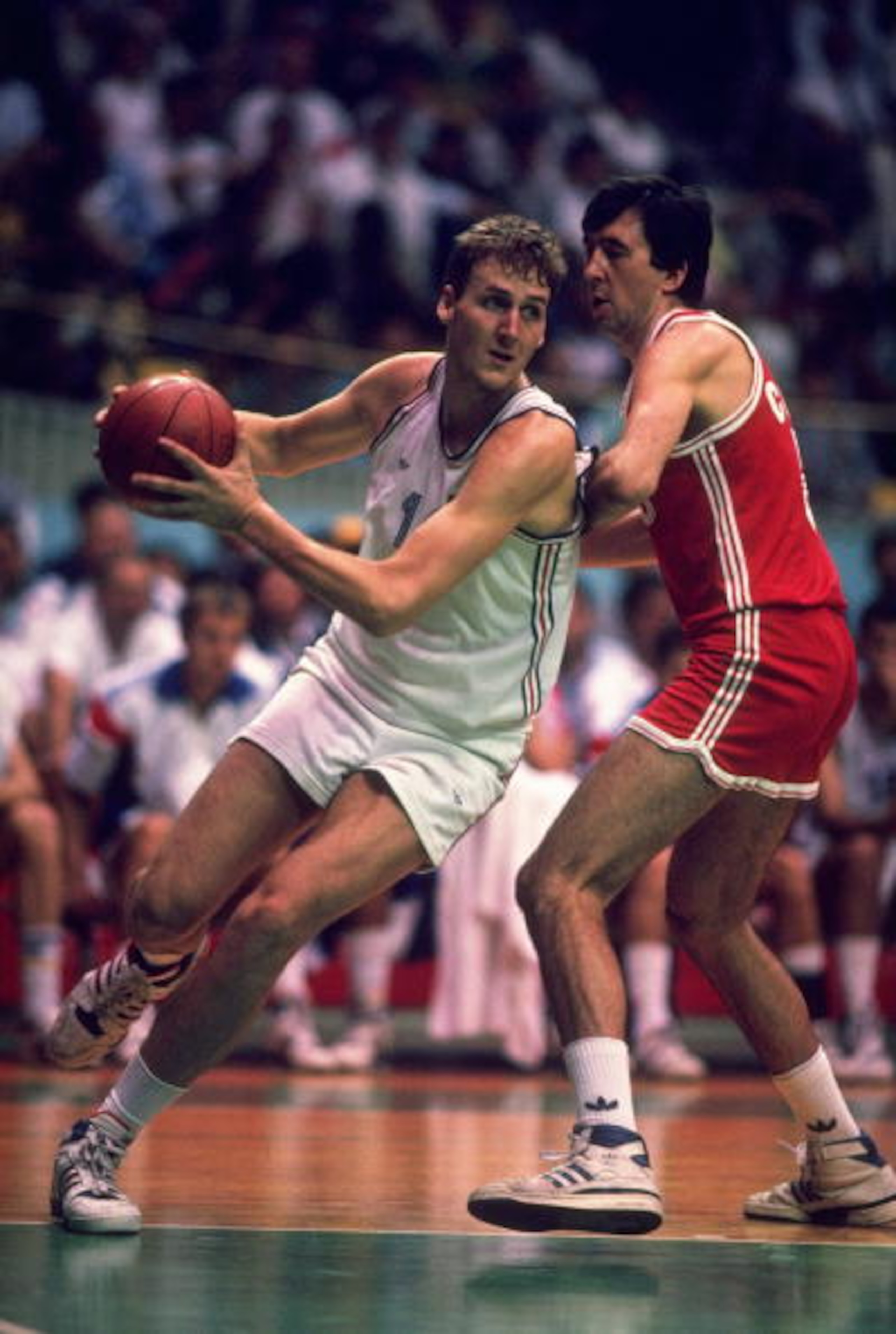 17 Sep-2 Oct 1988:  Dino Radja (left) of Yugoslavia evades Tilt Sokk (right) of the Soviet Union during a match in the Basketball event at the 1988 Olympic Games in Seoul, South Korea. \ Mandatory Credit: Allsport UK /Allsport