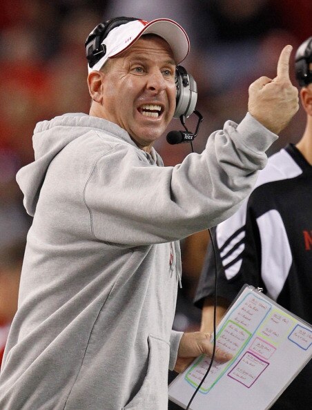ARLINGTON, TX - DECEMBER 04:  Head coach Bo Pelini of the Nebraska Cornhuskers leads his team against the Oklahoma Sooners at Cowboys Stadium on December 4, 2010 in Arlington, Texas. The Sooners beat the Cornhuskers 23-20.  (Photo by Tom Pennington/Getty