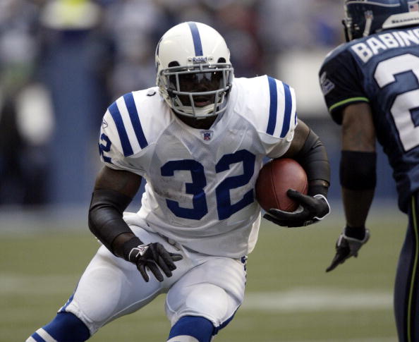 SEATTLE - DECEMBER 24:  Running back Edgerrin James #32 of the Indianapolis Colts rushes against the Seattle Seahawks at Qwest Field on December 24, 2005 in Seattle, Washington. The Seahawks defeated the Colts 28-13.  (Photo by Otto Greule Jr/Getty Images