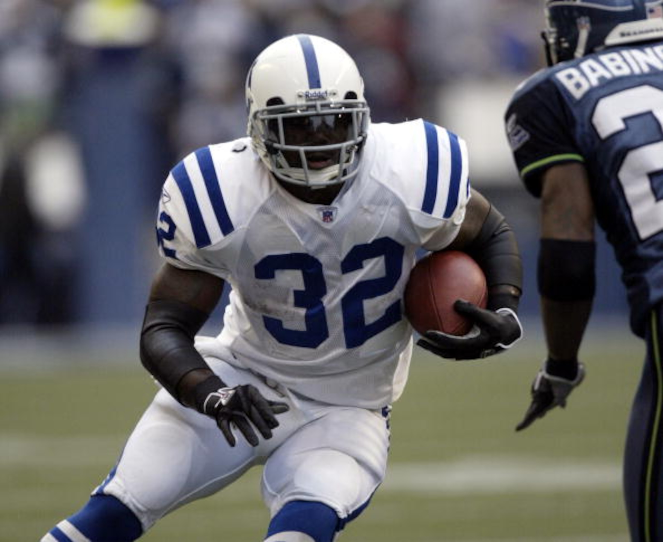 SEATTLE - DECEMBER 24: Running back Edgerrin James #32 of the Indianapolis Colts rushes against the Seattle Seahawks at Qwest Field on December 24, 2005 in Seattle, Washington. The Seahawks defeated the Colts 28-13. (Photo by Otto Greule Jr/Getty Images SEATTLE - DECEMBER 24: Running back Edgerrin James #32 of the Indianapolis Colts rushes against the Seattle Seahawks at Qwest Field on December 24, 2005 in Seattle, Washington. The Seahawks defeated the Colts 28-13. (Photo by Otto Greule Jr/Getty Images