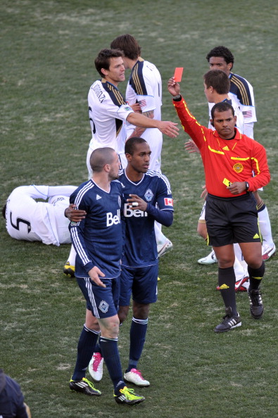 CHESTER, PA- MARCH 26: Referee Yader Reyes issues a red card to Eric Hassli #29 of the Vancouver Whitecaps during the game against the Philadelphia Union at PPL Park on March 26, 2011 in Chester, Pennsylvania. The Union won 1-0. (Photo by Drew Hallowell/G