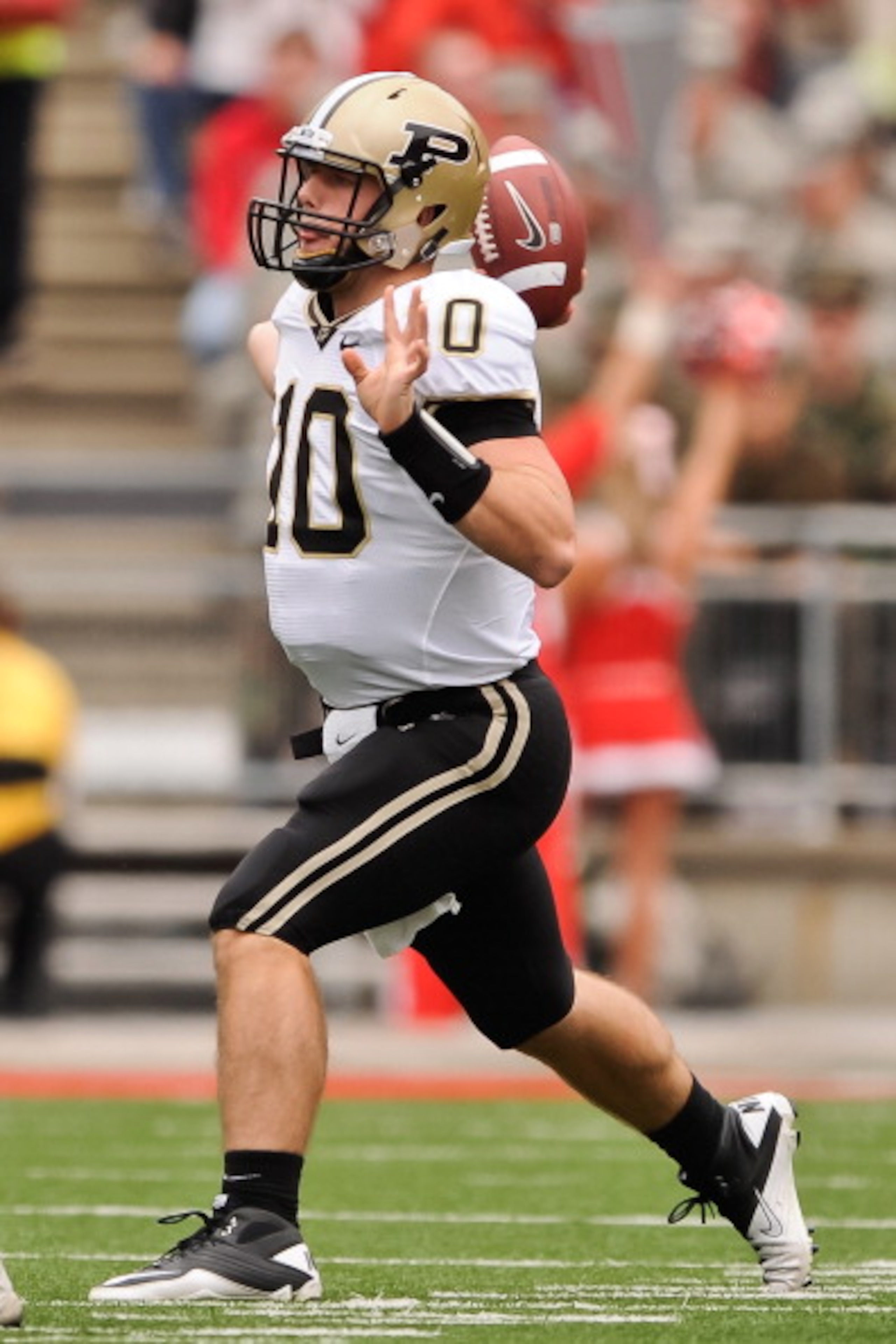 COLUMBUS, OH - OCTOBER 23:  Quarterback Sean Robinson #10 of the Purdue Boilermakers passes against the Ohio State Buckeyes at Ohio Stadium on October 23, 2010 in Columbus, Ohio.  (Photo by Jamie Sabau/Getty Images)